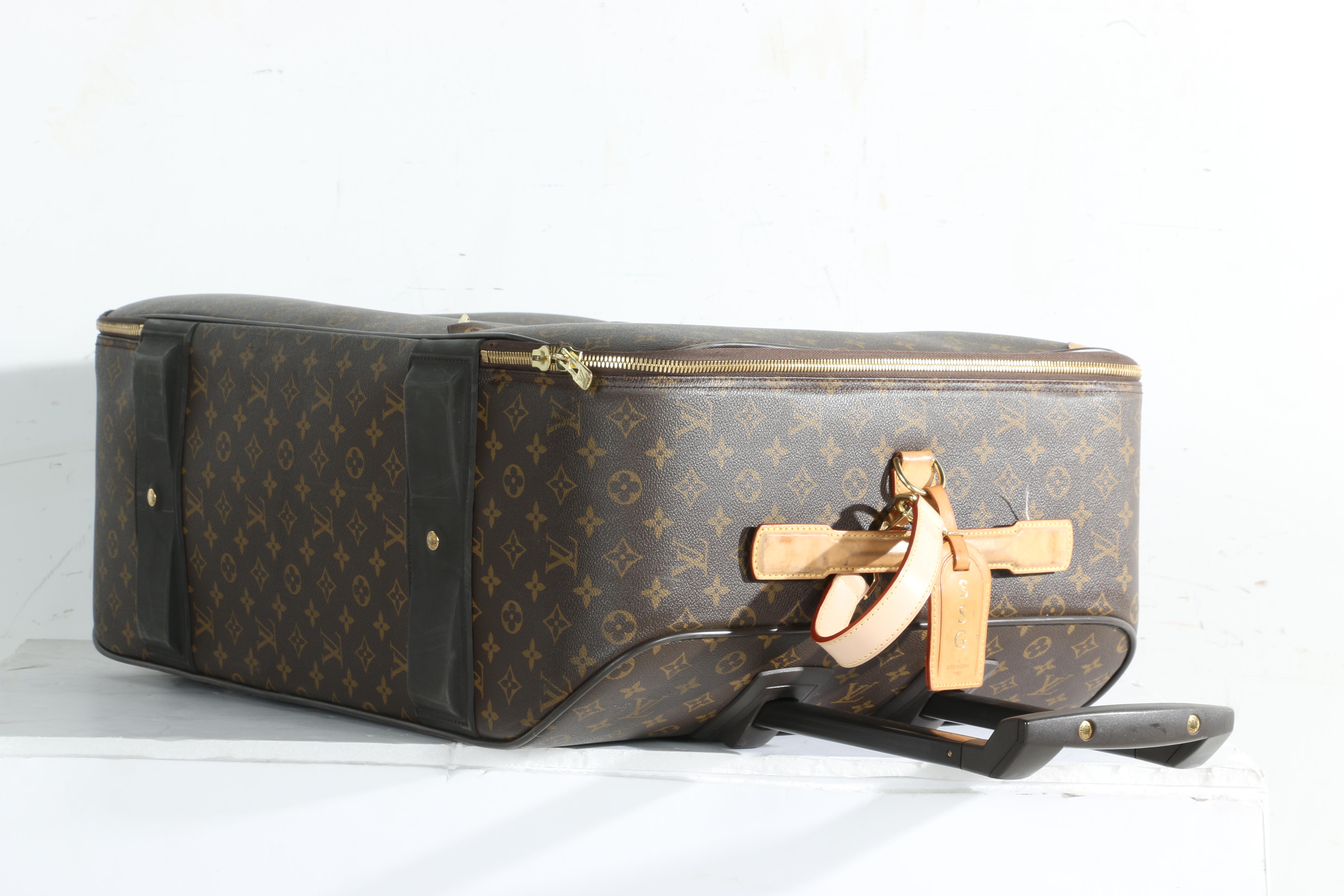 Louis Vuitton Monogram Rolling Suitcase