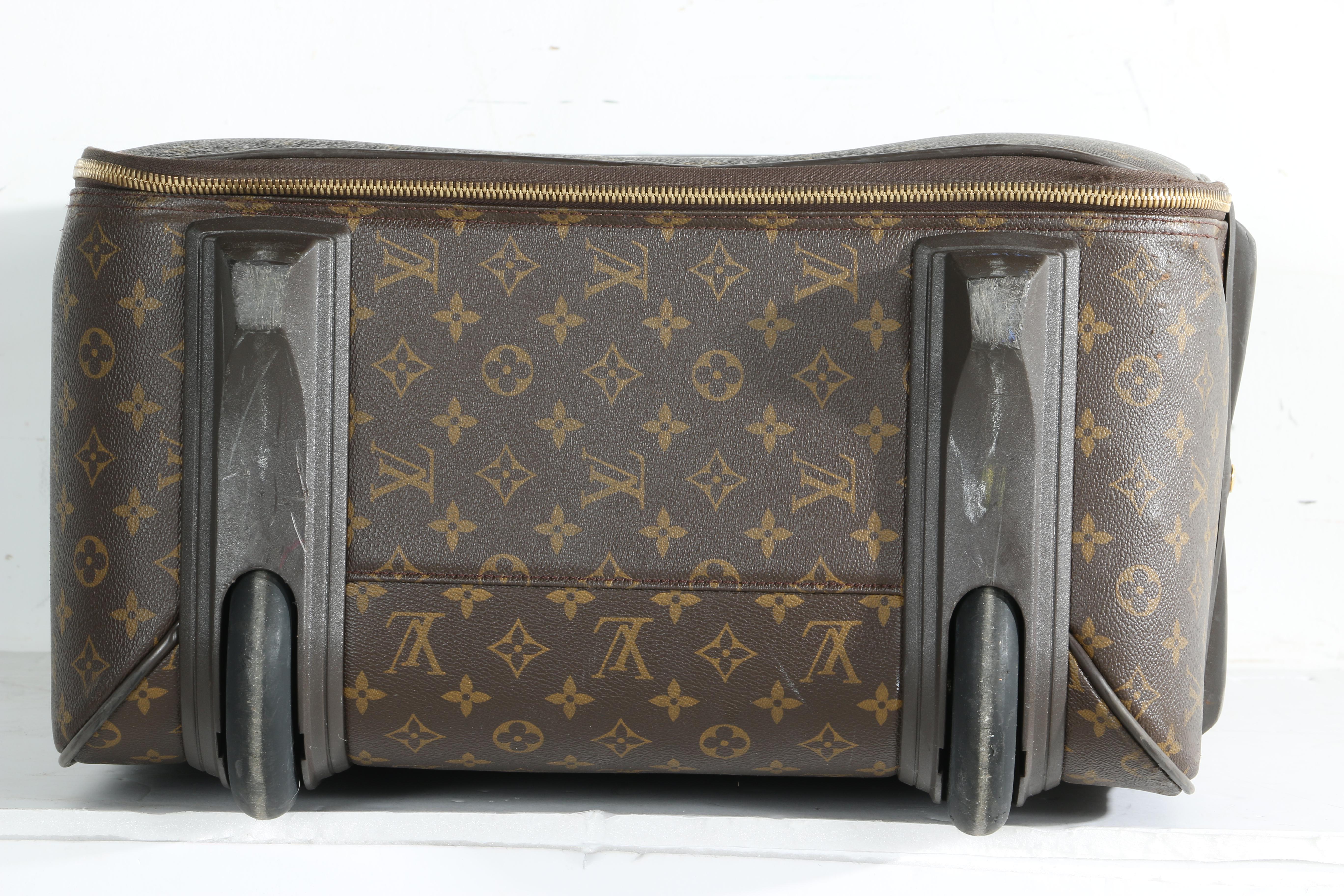 Louis Vuitton Monogram Rolling Suitcase