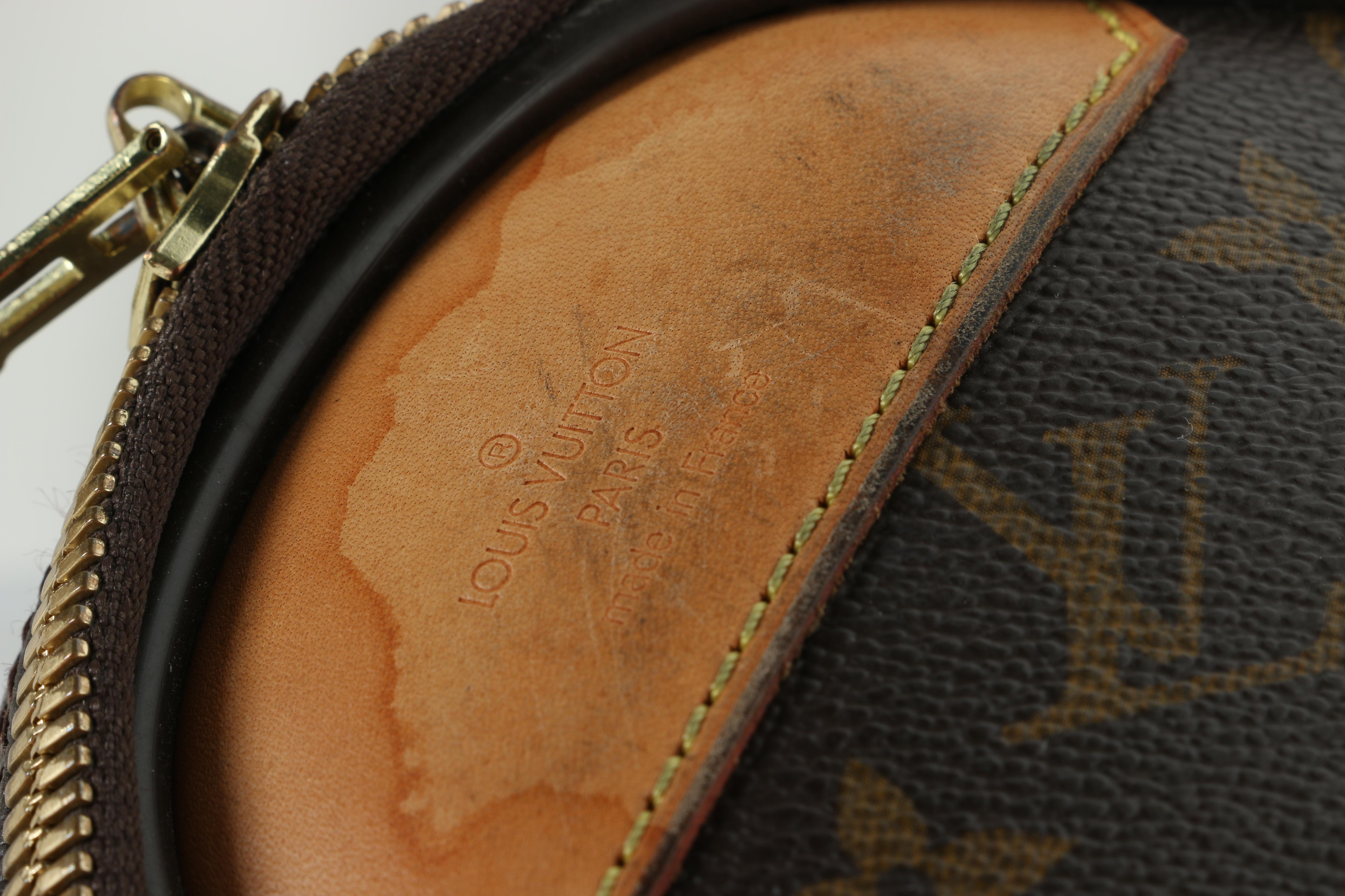 Louis Vuitton Monogram Rolling Suitcase