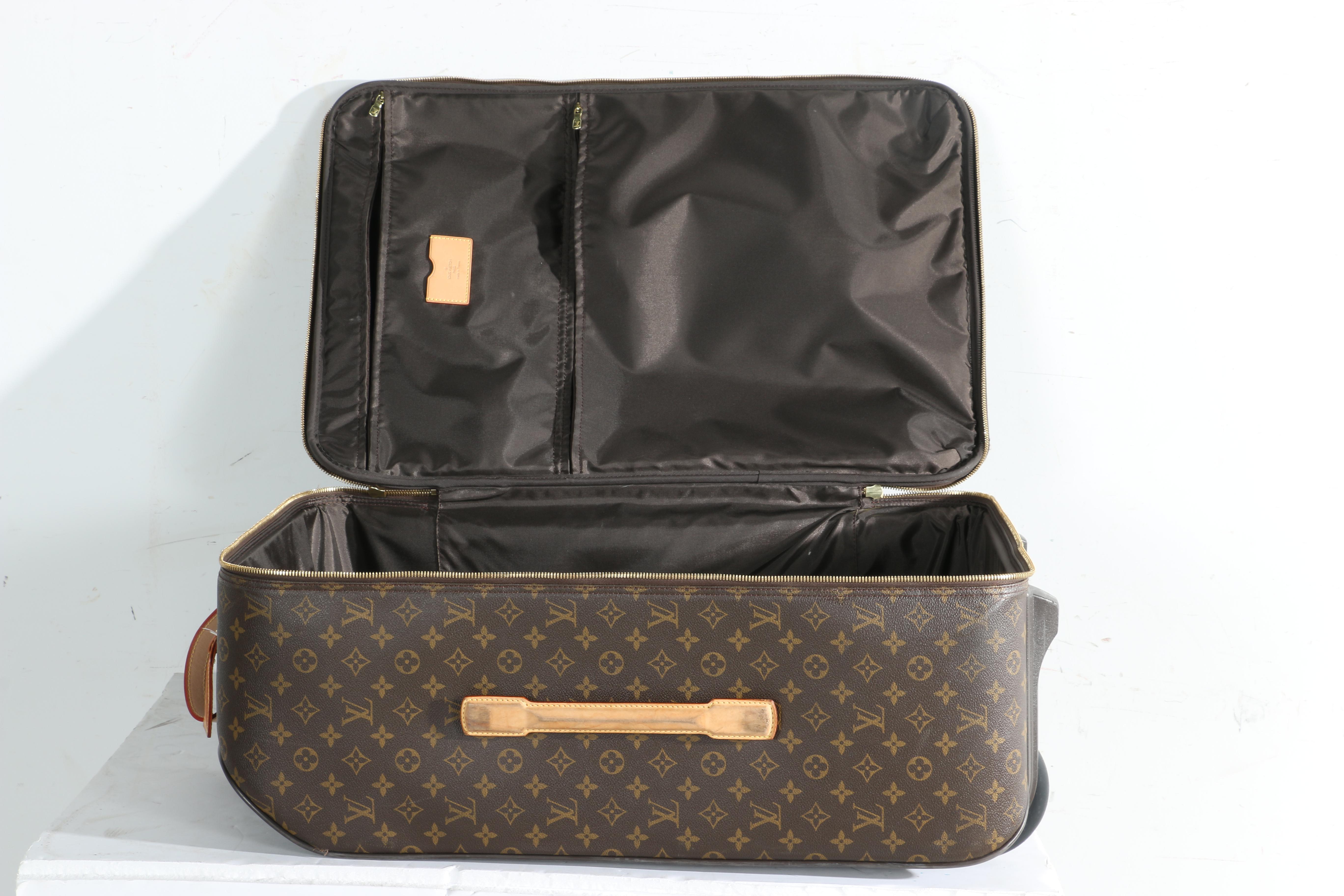 Louis Vuitton Monogram Rolling Suitcase