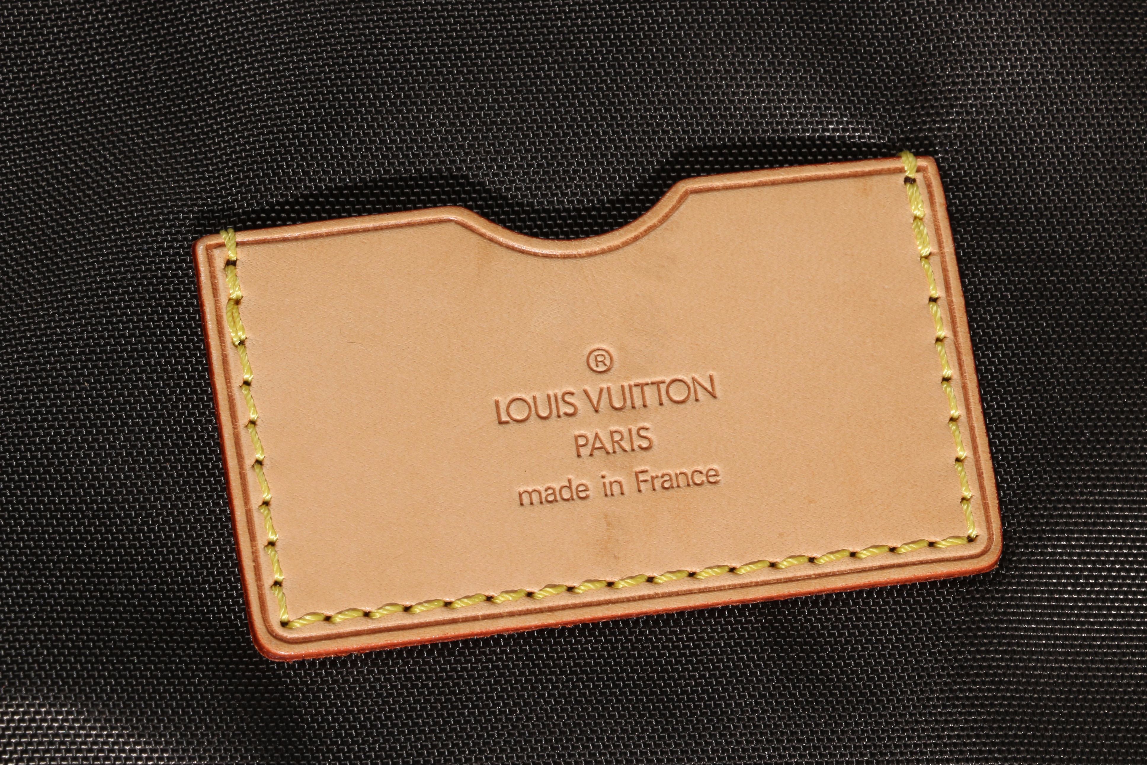 Louis Vuitton Monogram Rolling Suitcase