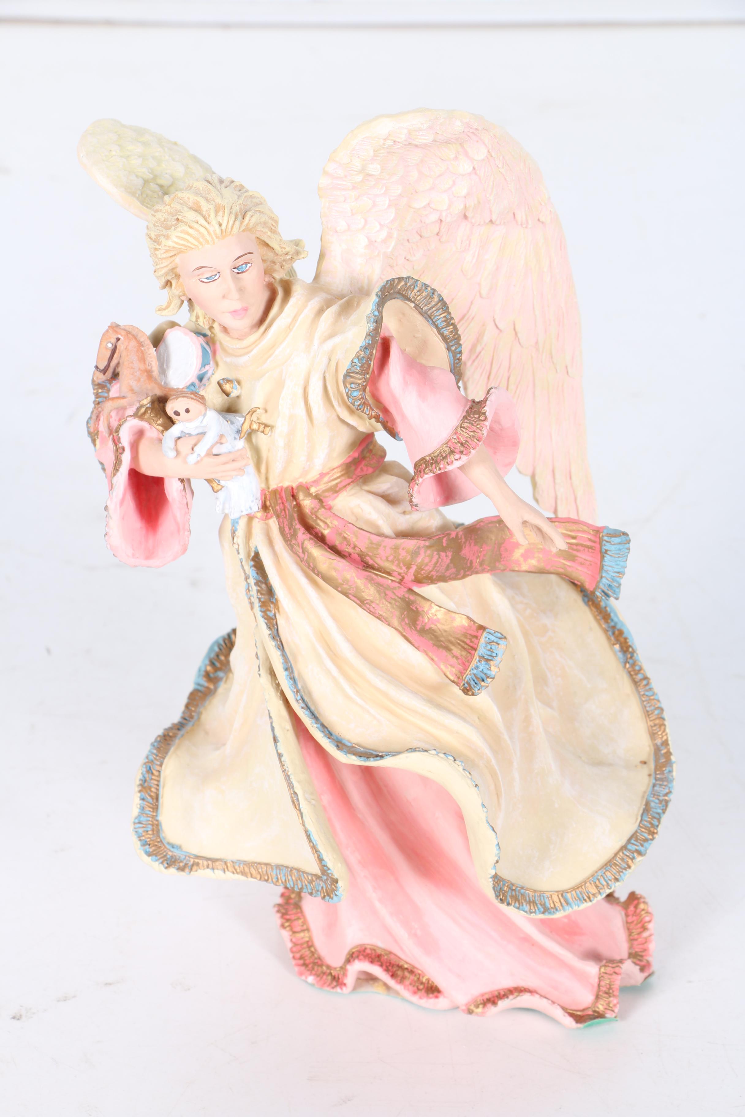 Holiday Figurines Including Duncan Royale and Clothtique