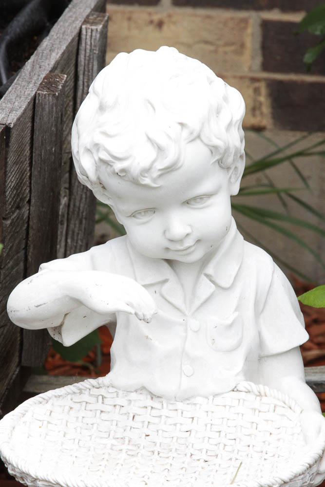 Garden Figures of a Boy and Girl