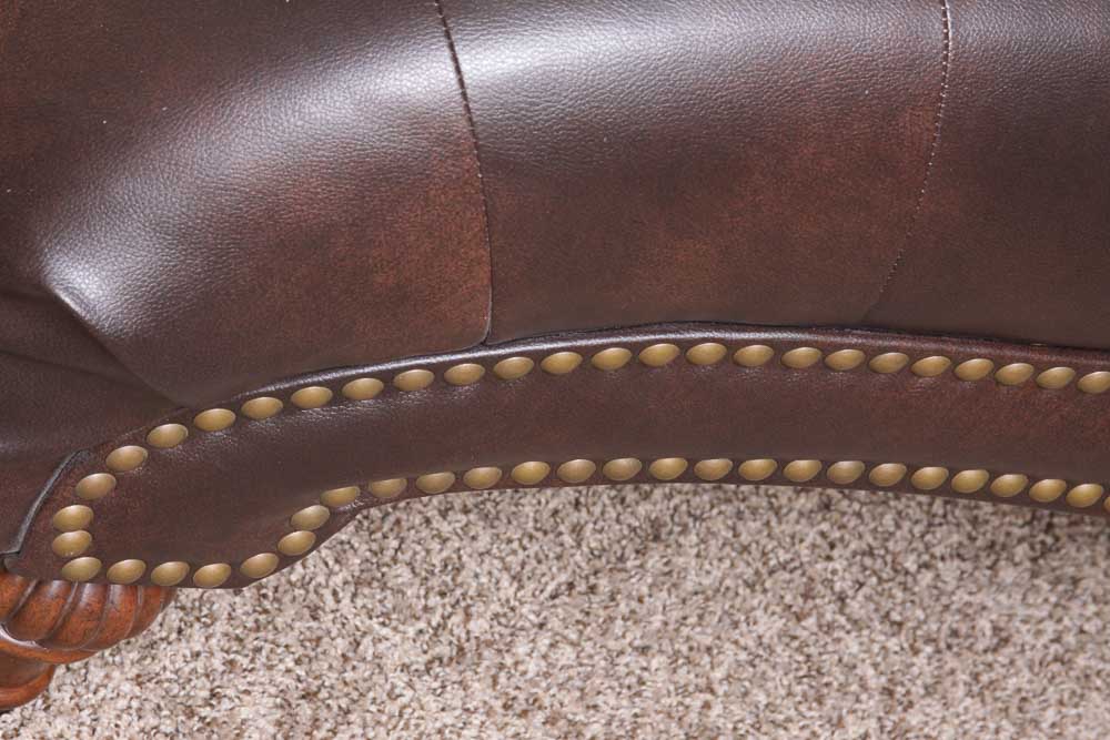 Ashley Furniture Tufted Faux Leather Lounge
