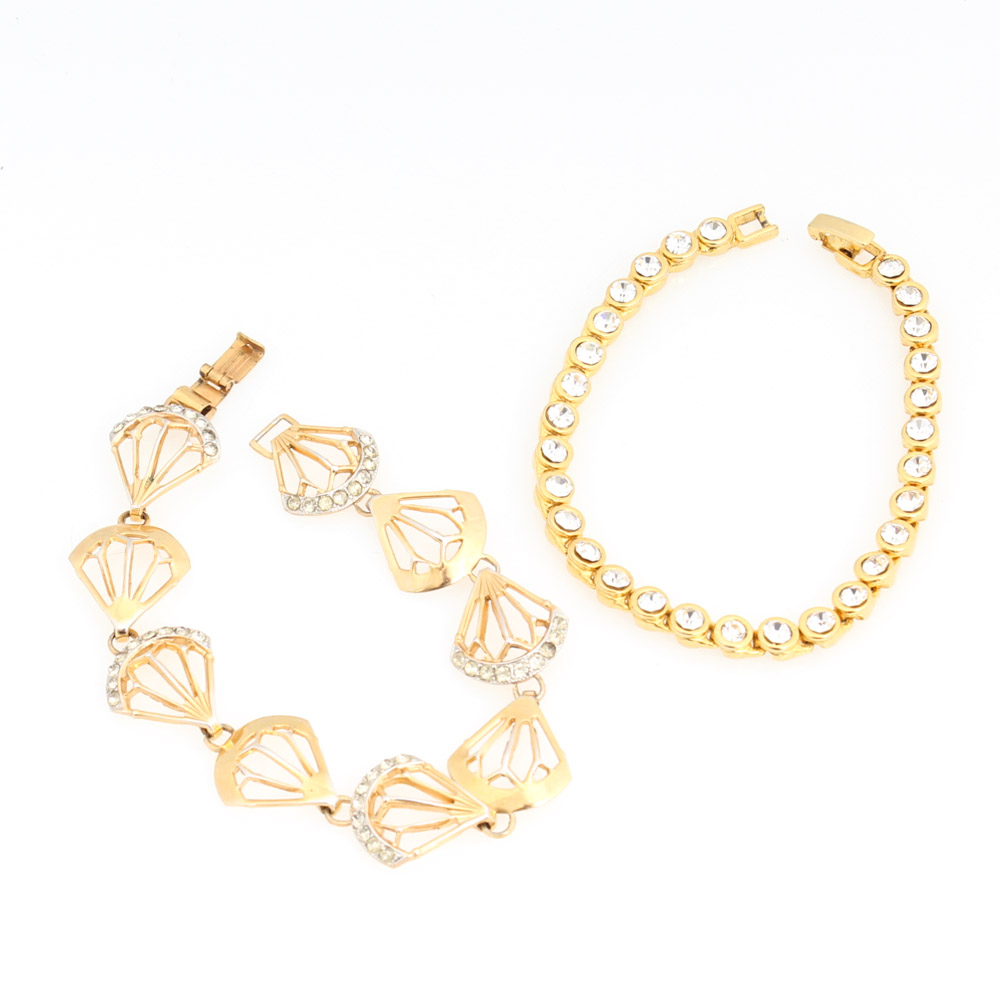 Pair of Gold-Tone Bracelets Featuring Jeray