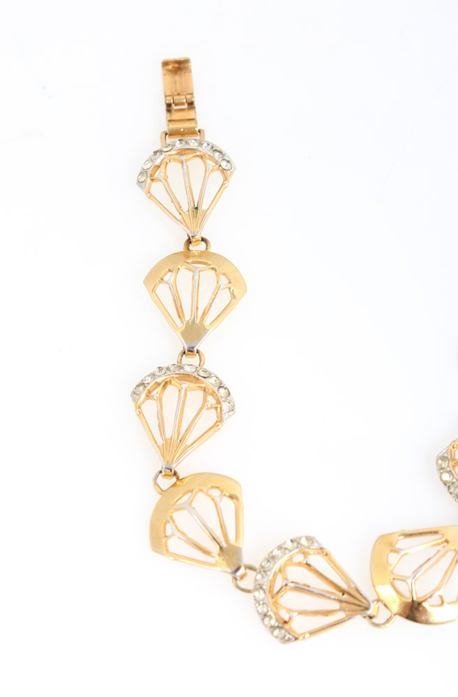 Pair of Gold-Tone Bracelets Featuring Jeray