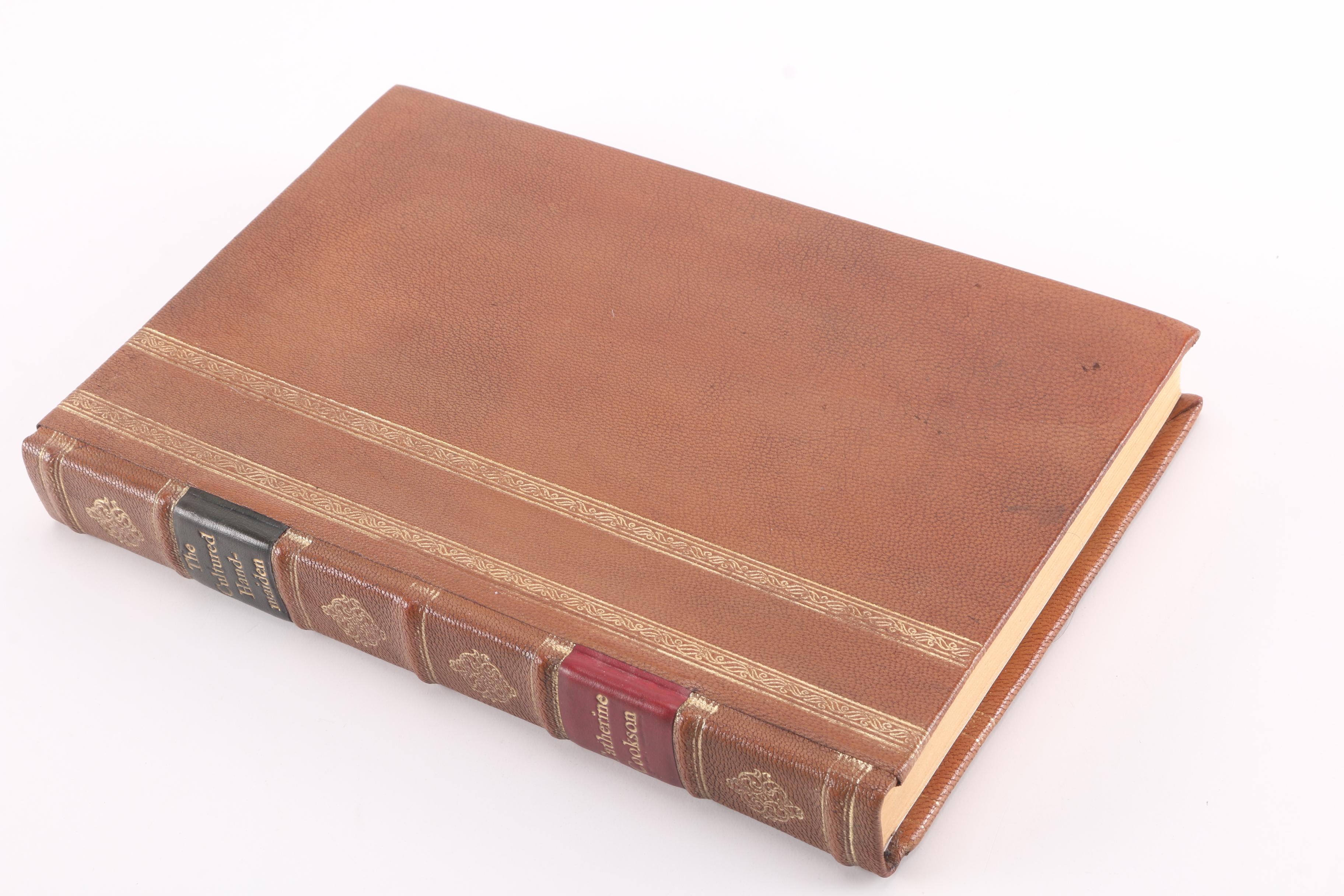 Leather Bound Books Including First Edition "The Cultured Handmaiden" by Catherine Cookson