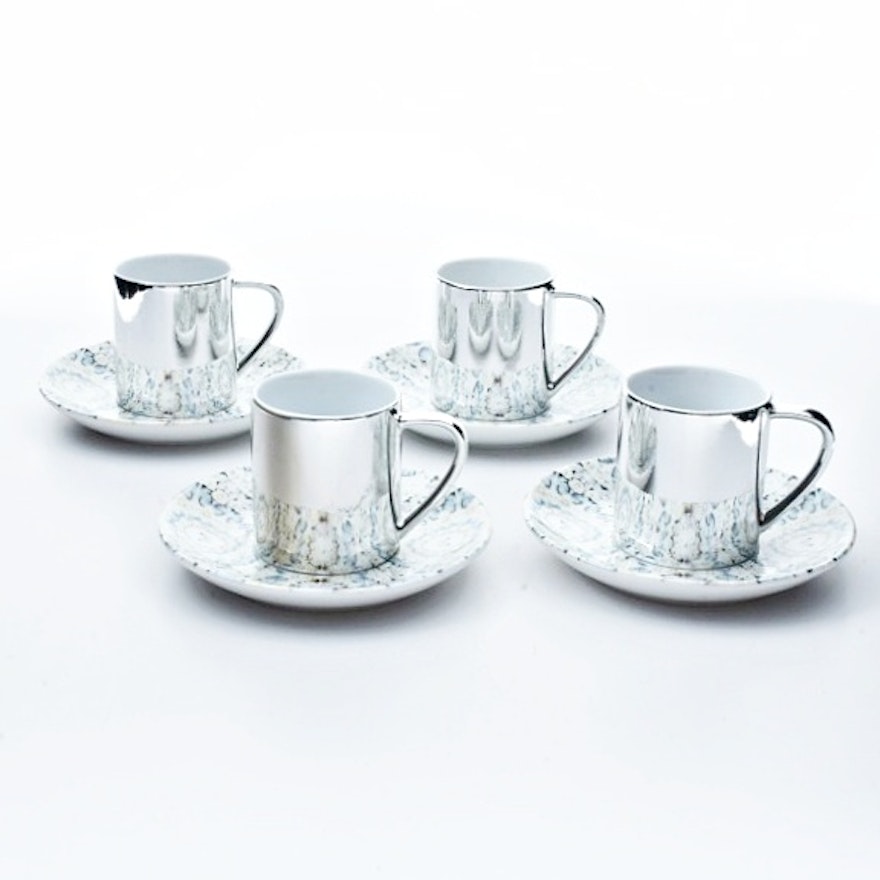 Four Damien Hirst "Virtue" Electroplated Cups and Saucers