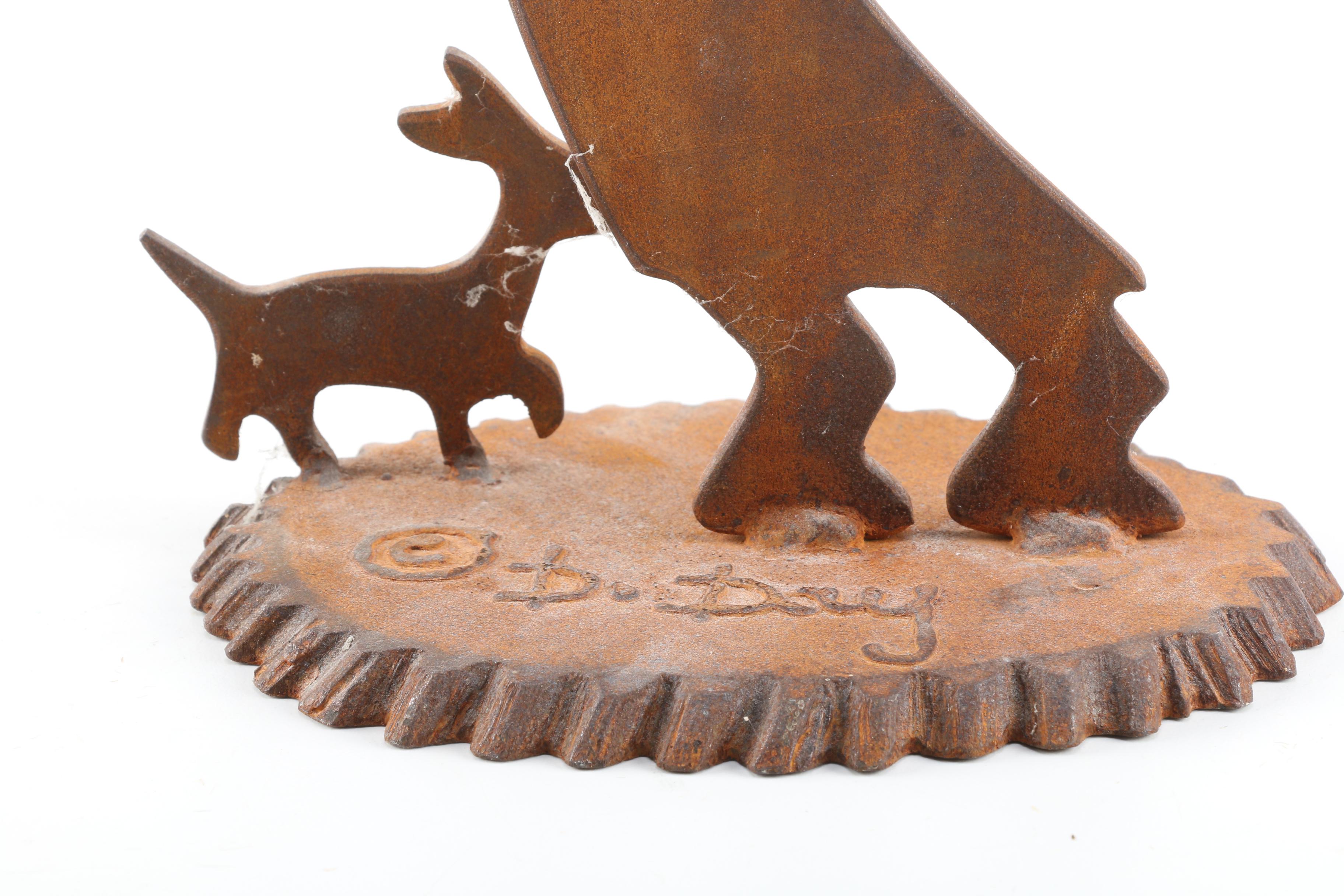 Iron Sculpture of Kokopelli and Dog