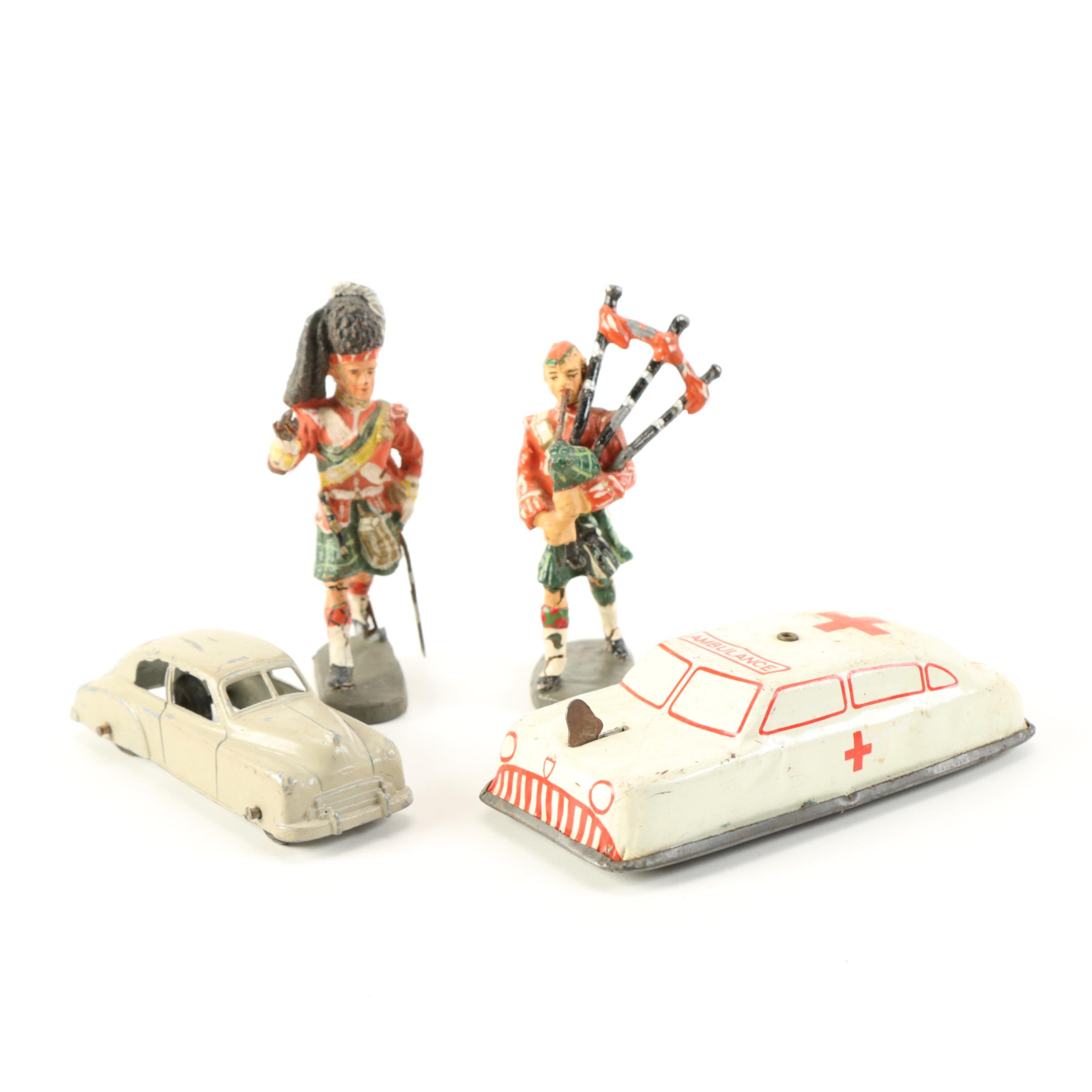 Die-Cast Cars and Elastolin Figures