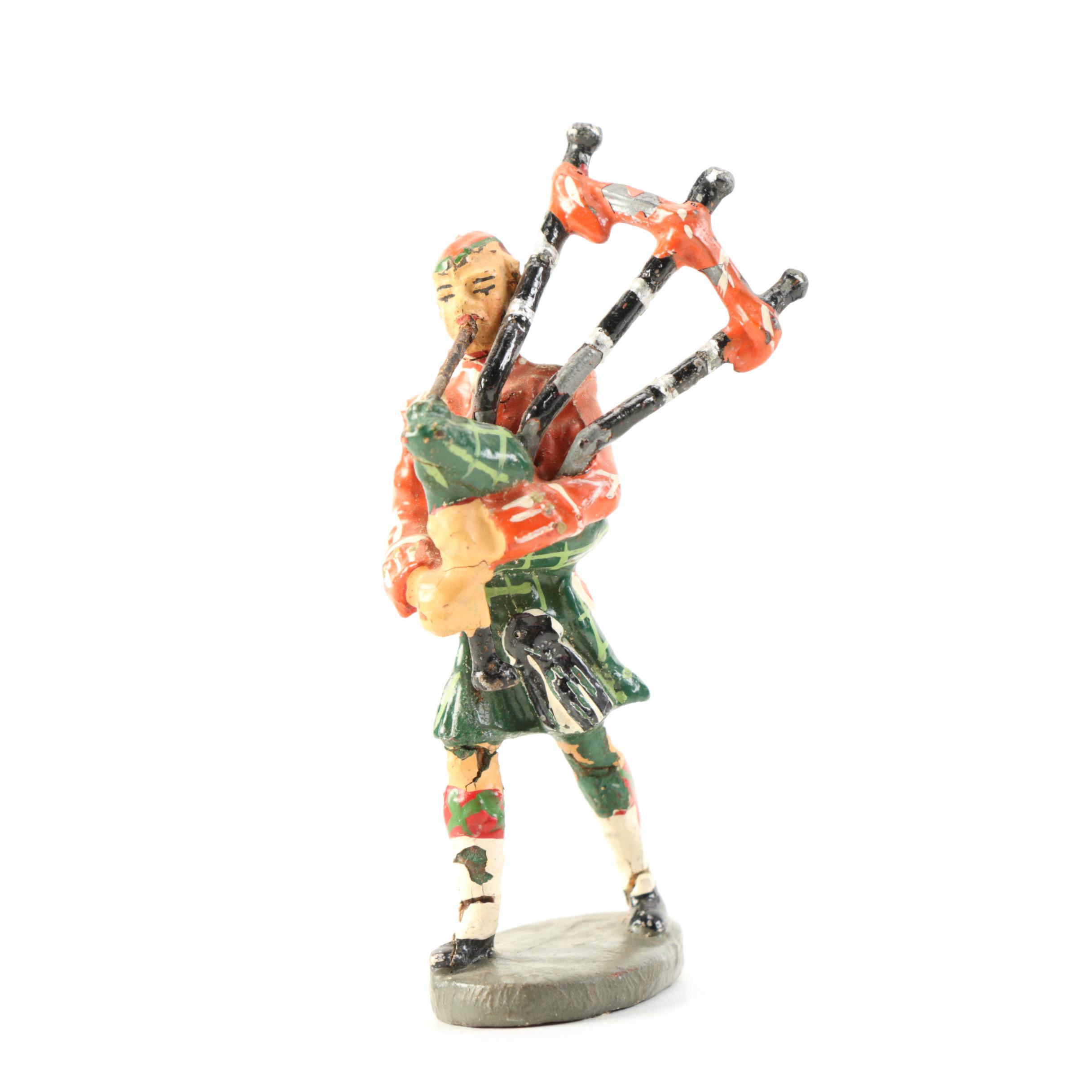 Die-Cast Cars and Elastolin Figures