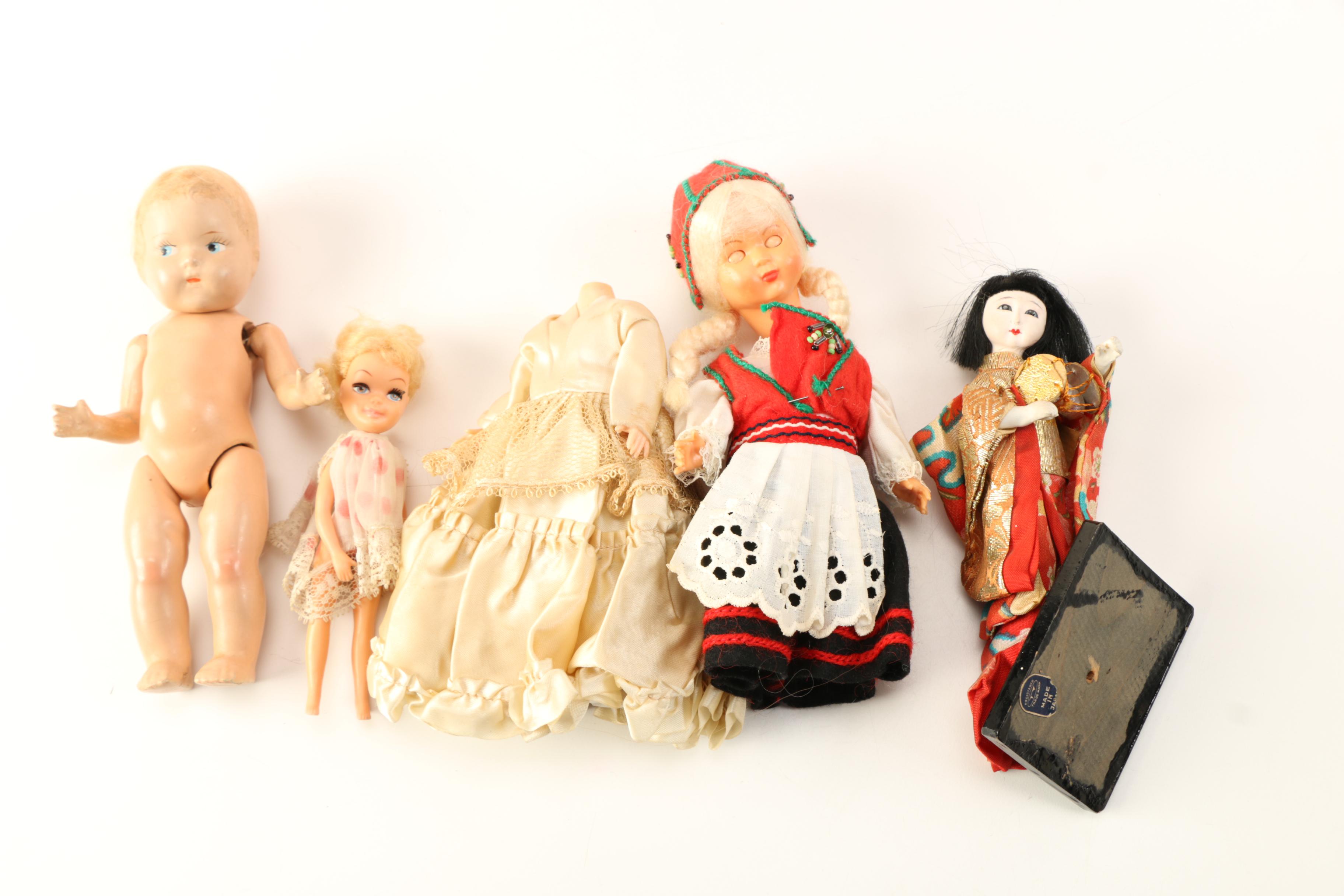 Asssorted Dolls and Doll Clothing