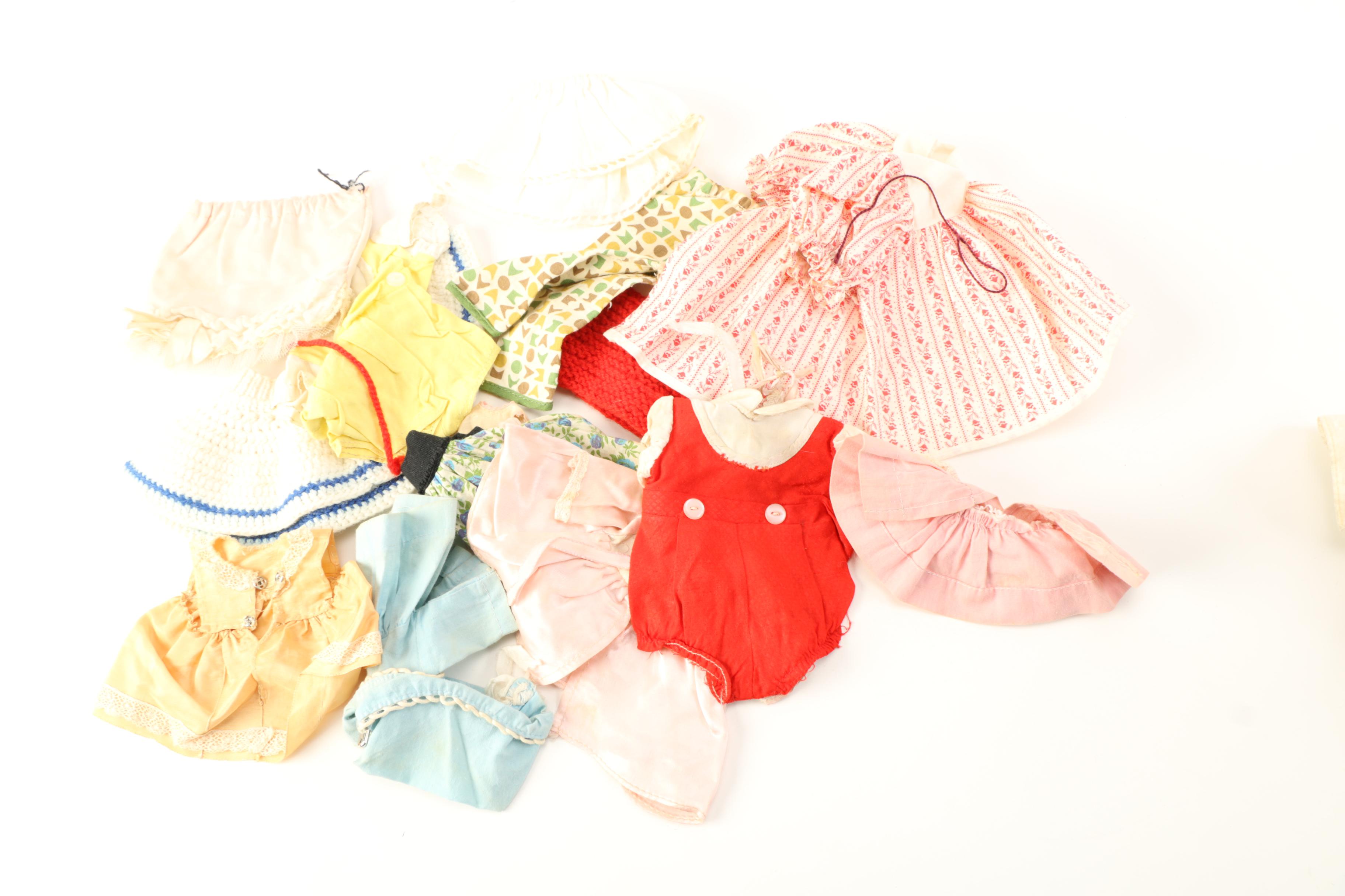 Asssorted Dolls and Doll Clothing