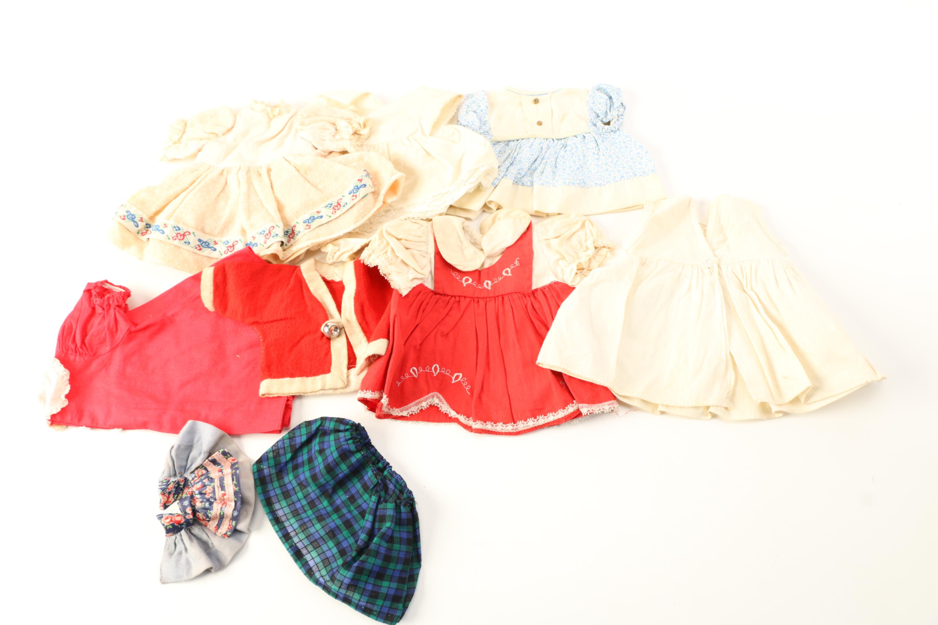 Asssorted Dolls and Doll Clothing