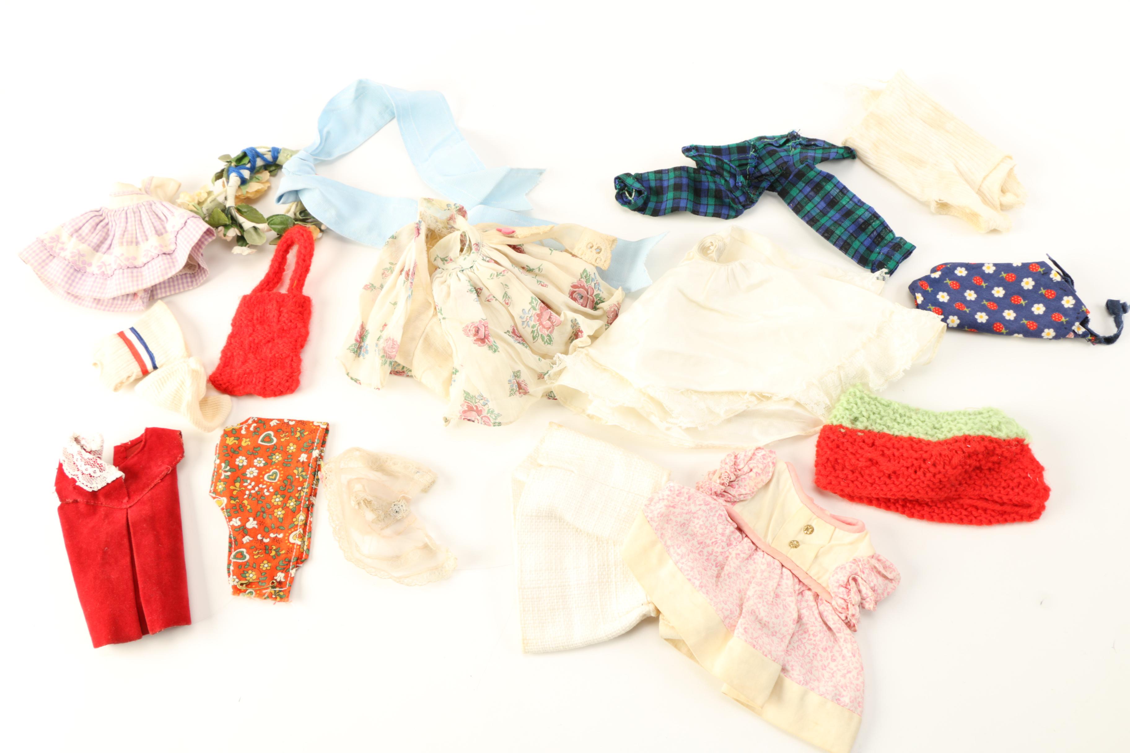 Asssorted Dolls and Doll Clothing
