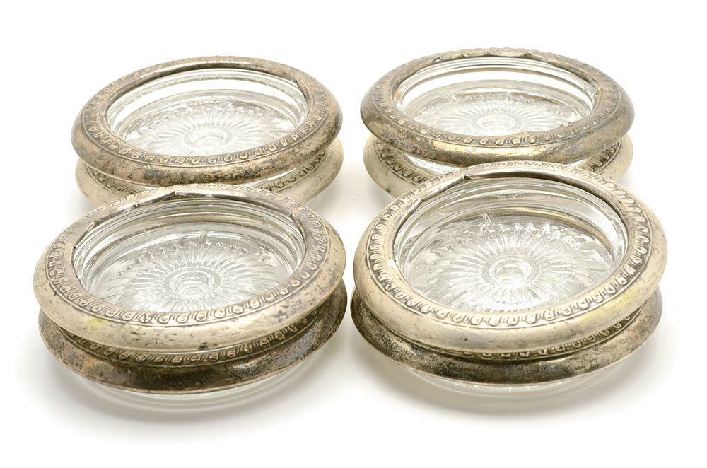 Eight Sterling and Glass Coasters