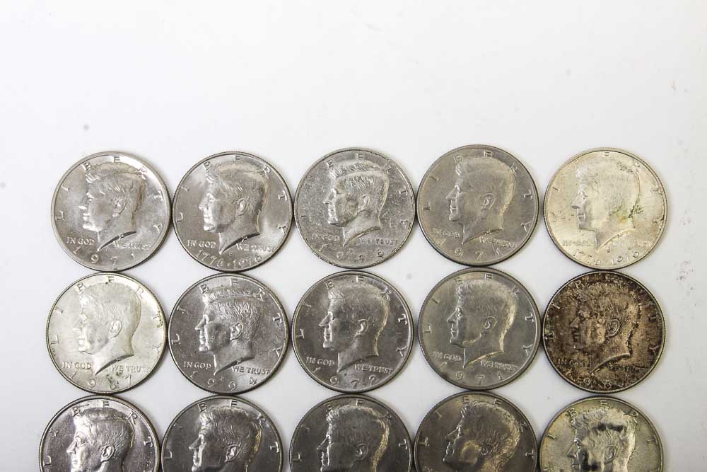 Eisenhower Dollar and Kennedy Half Dollar Coins