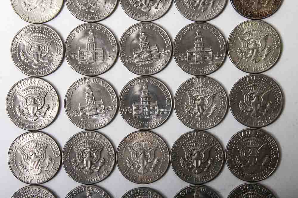 Eisenhower Dollar and Kennedy Half Dollar Coins