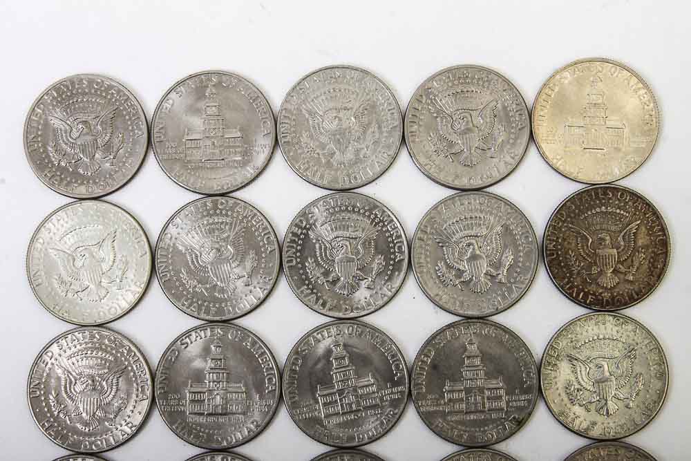 Eisenhower Dollar and Kennedy Half Dollar Coins