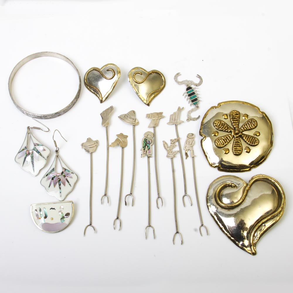 Variety of Mexican Silver-Tone Jewelry and Tableware