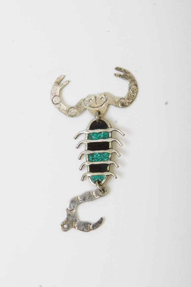 Variety of Mexican Silver-Tone Jewelry and Tableware