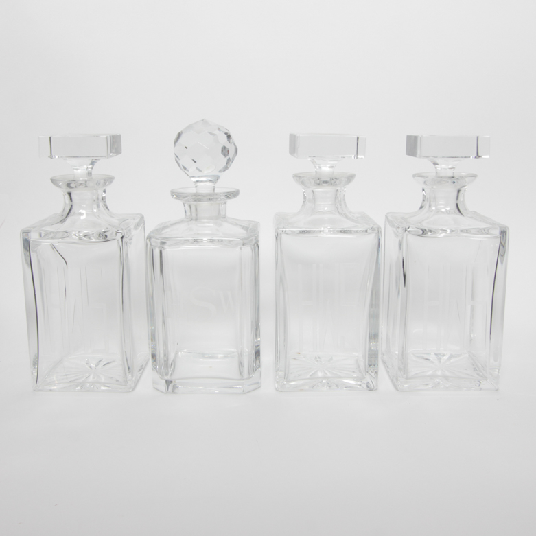 Four Vintage Monogrammed Glass Decanters