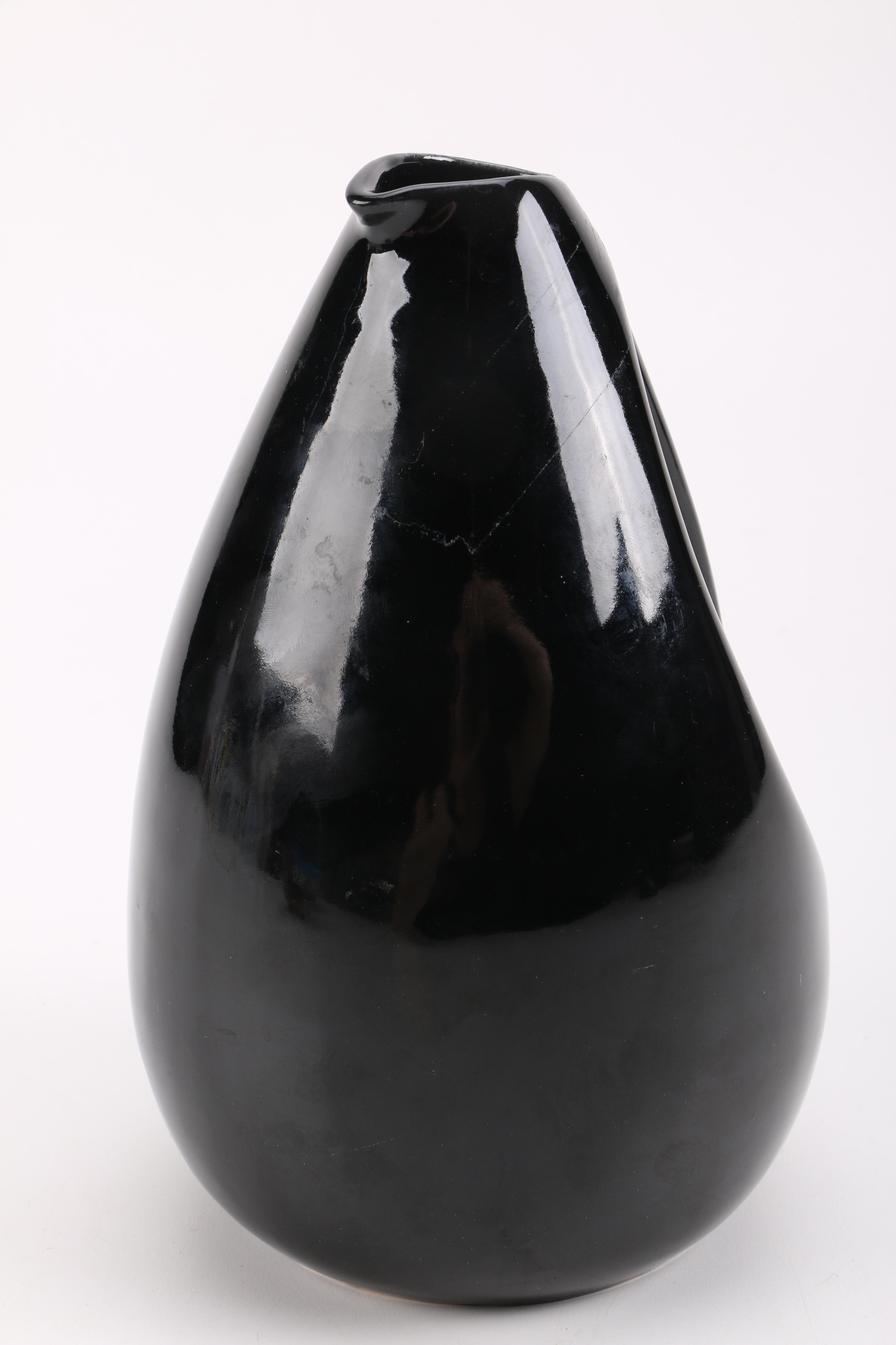 Black Pitcher and Footed Bowls