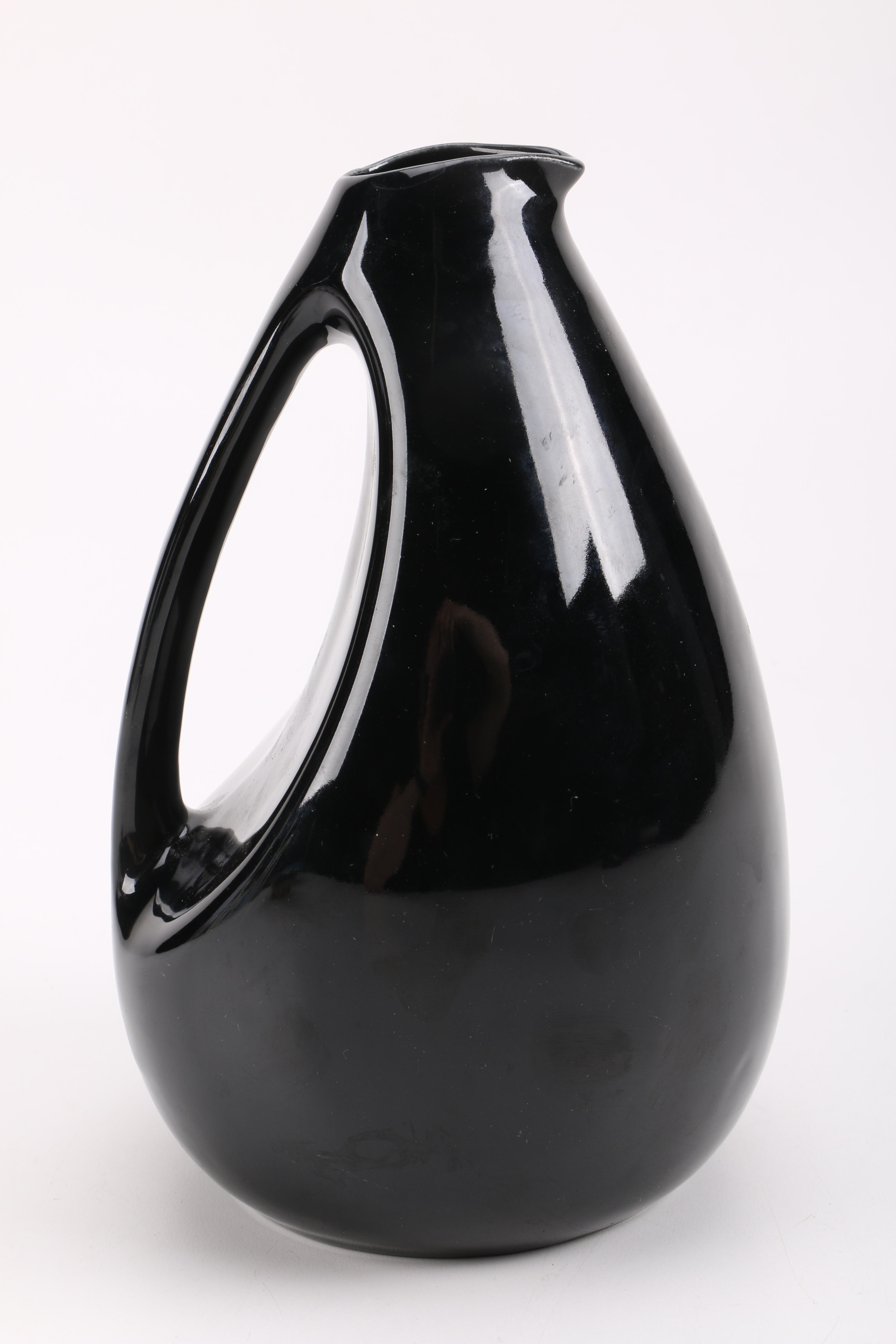 Black Pitcher and Footed Bowls