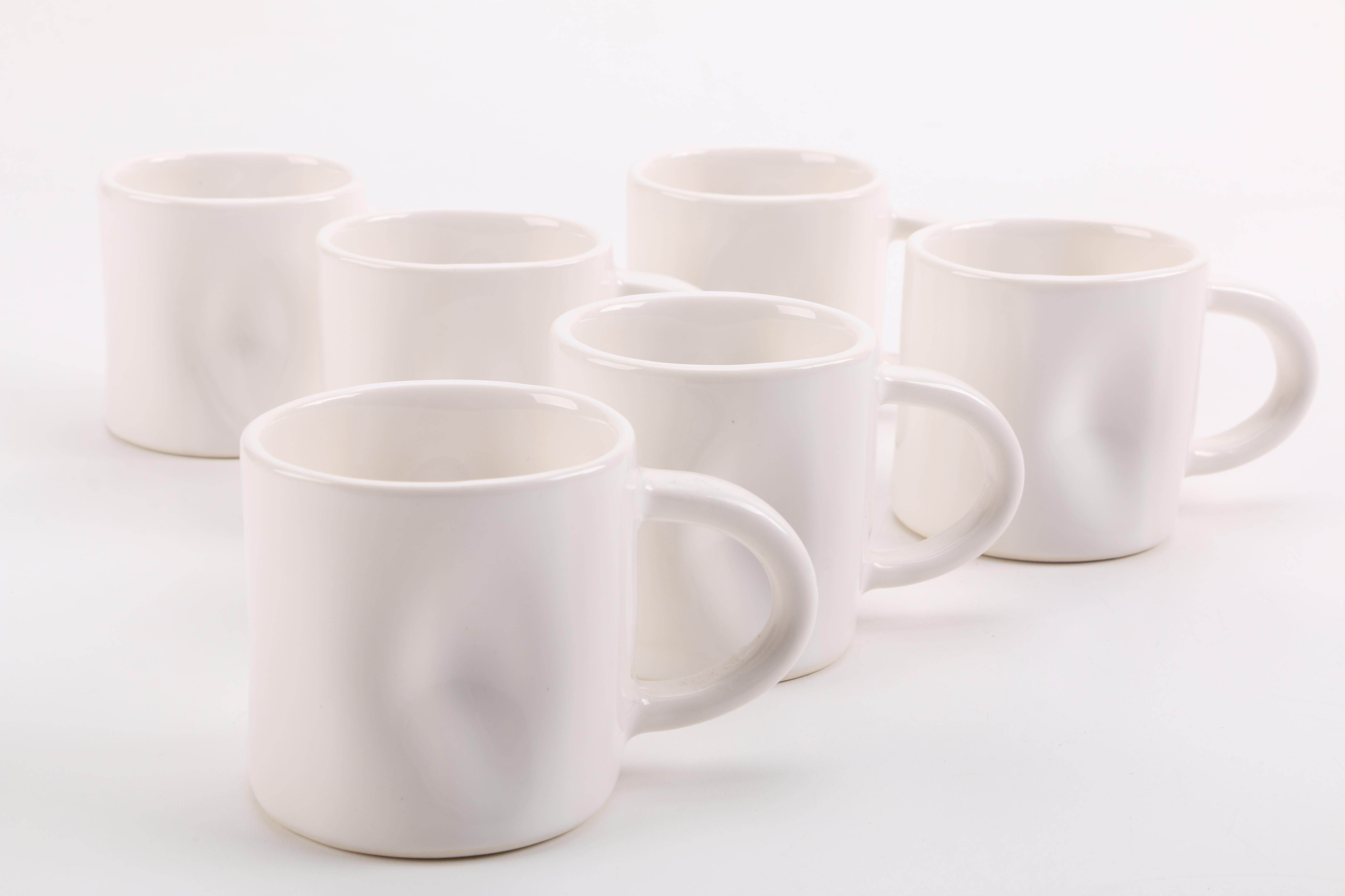 Handmade White Ceramic Mugs and Saucers