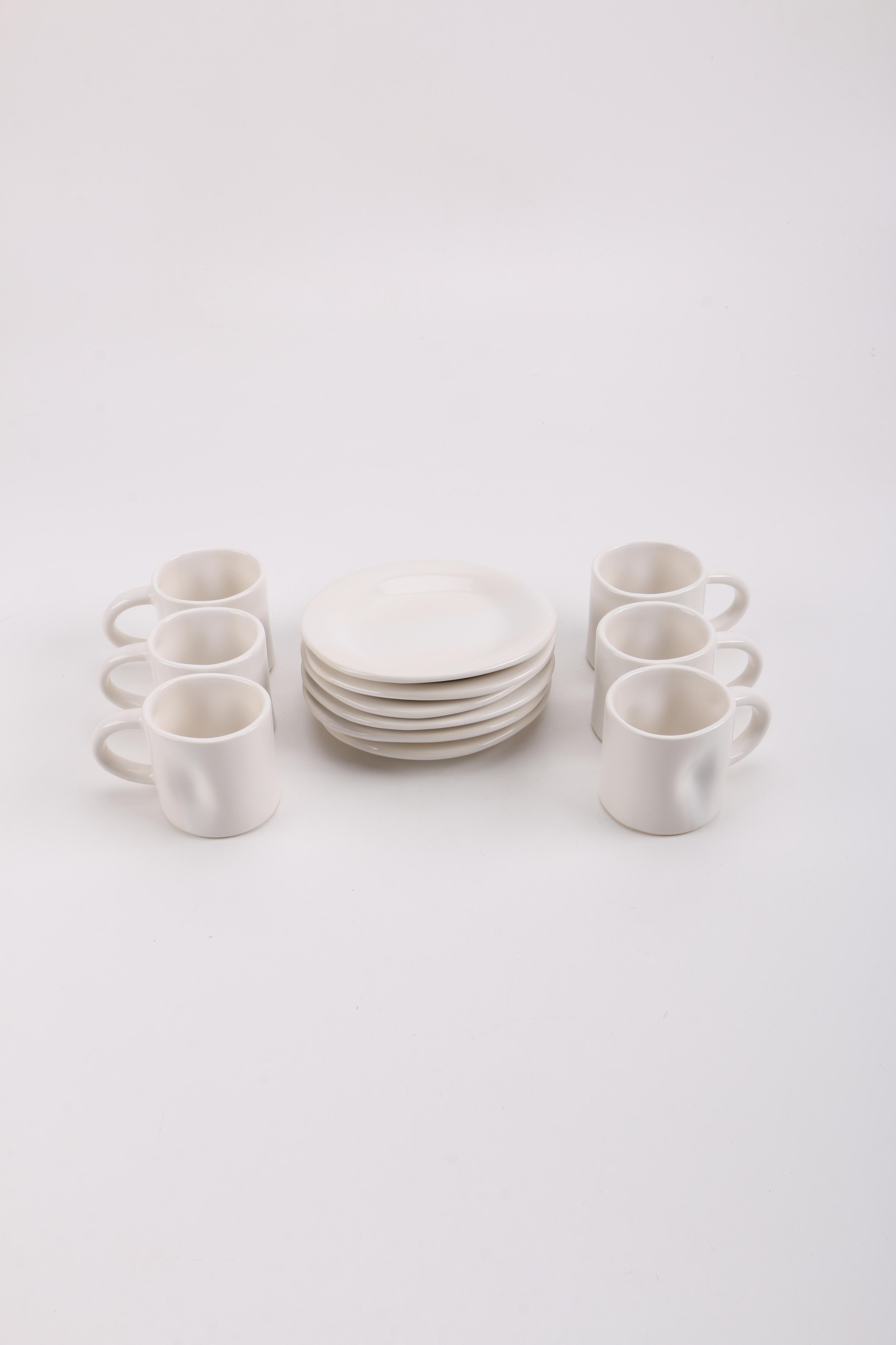 Handmade White Ceramic Mugs and Saucers