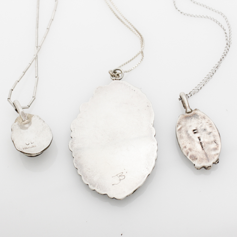 Navajo Sterling Silver Turquoise Pendants by James Boyd, Clyde Begay, and Irma Ignacio