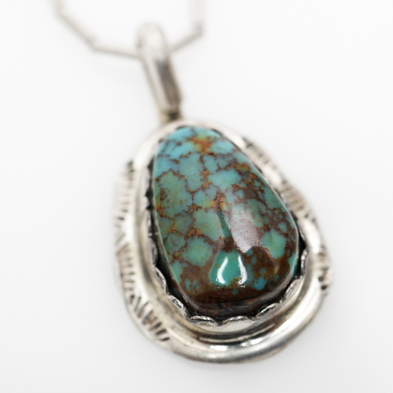 Navajo Sterling Silver Turquoise Pendants by James Boyd, Clyde Begay, and Irma Ignacio