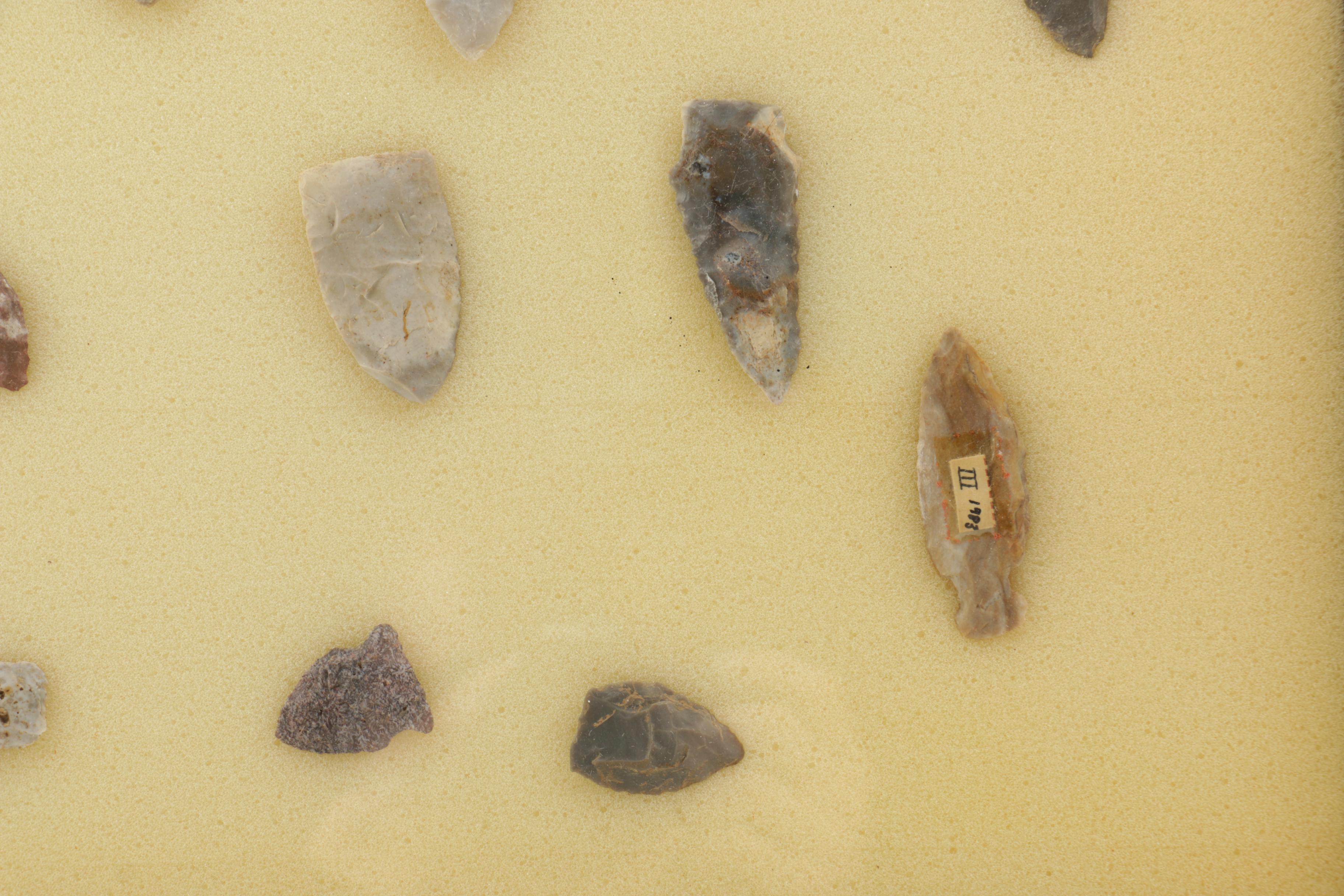 Stone Arrow Head In Display Case