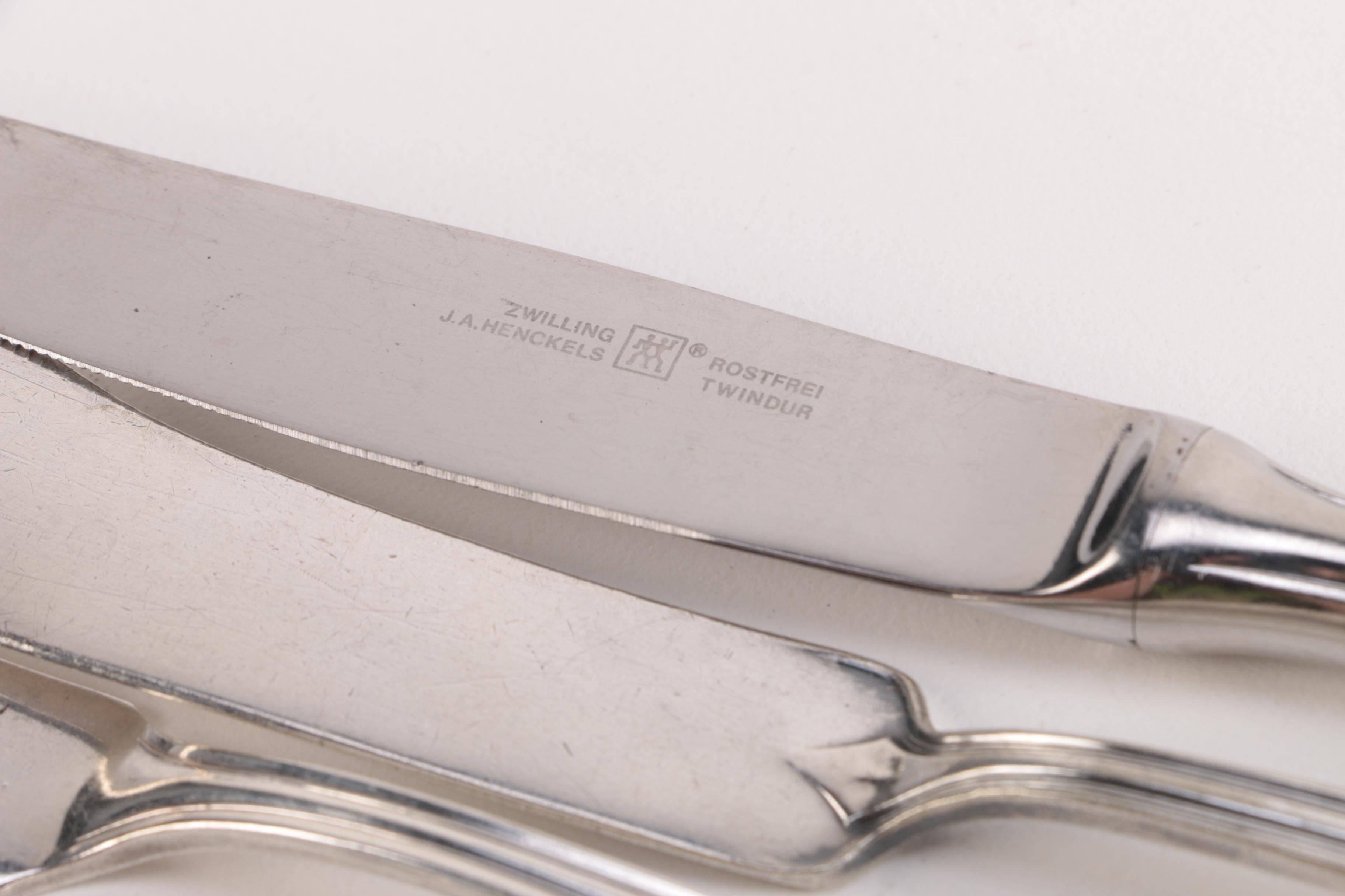 Assortment of Silver Plate and Stainless Steel Flatware Featuring Roger Bros.