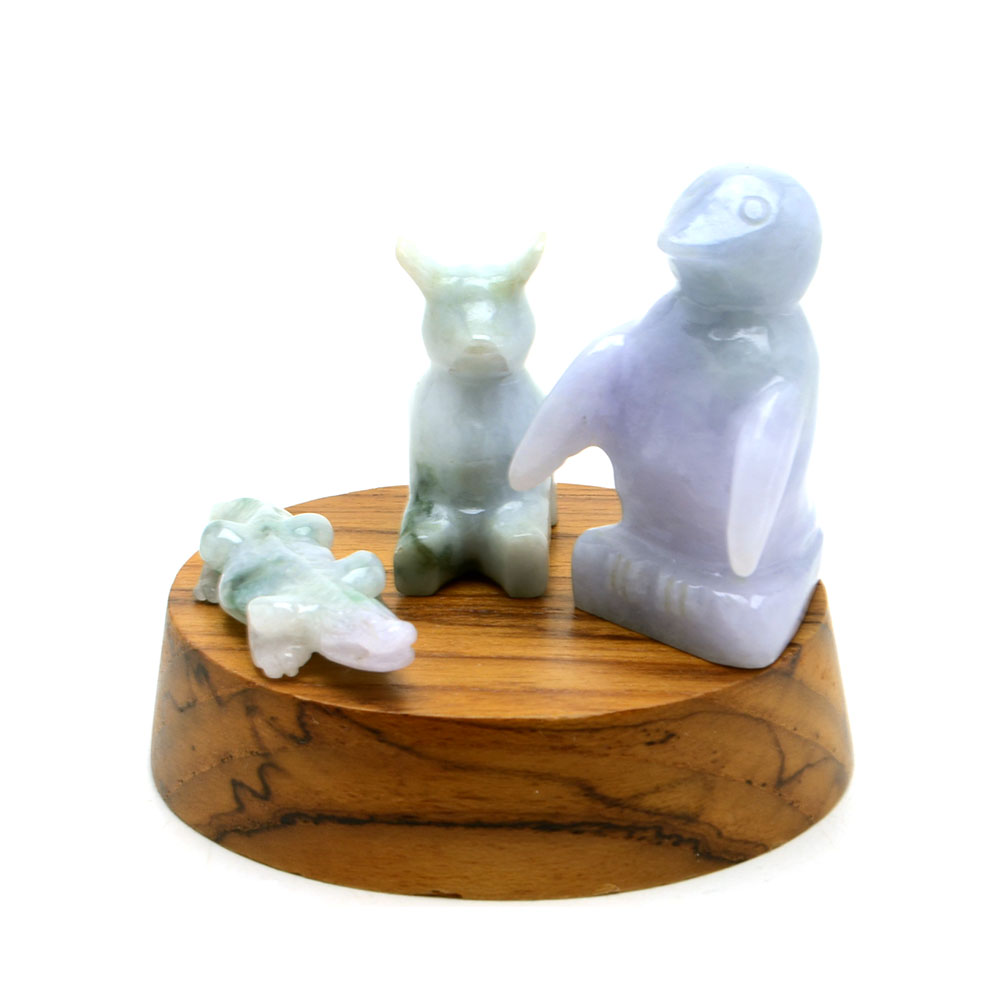 Carved Jadeite Figures Including Penguin, Alligator, and More