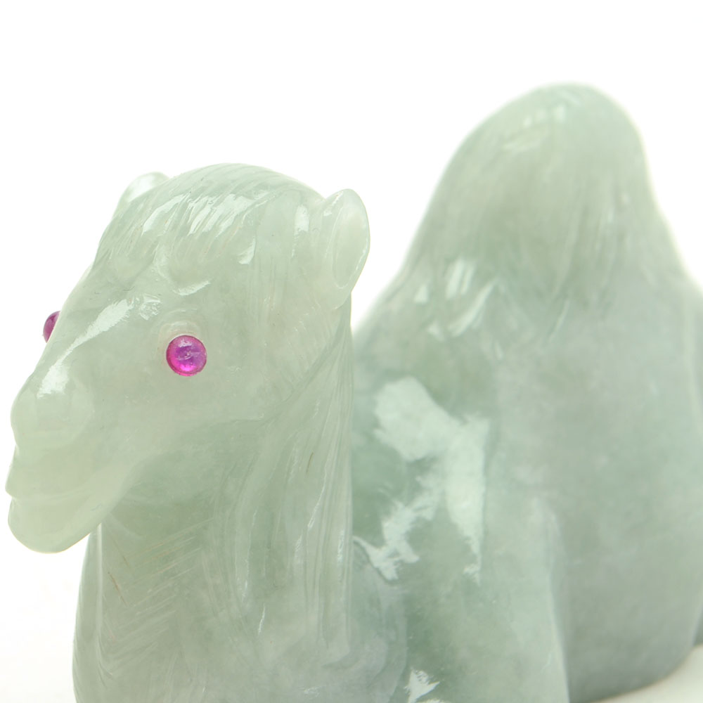 Carved Jadeite Camel Figure with Ruby Eyes