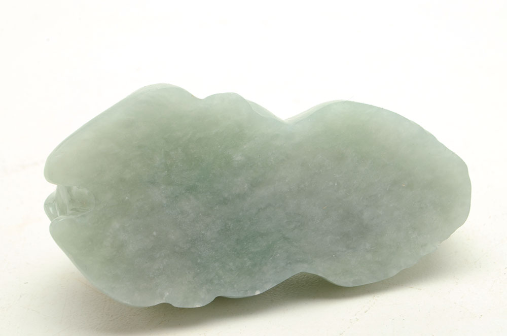 Carved Jadeite Camel Figure with Ruby Eyes