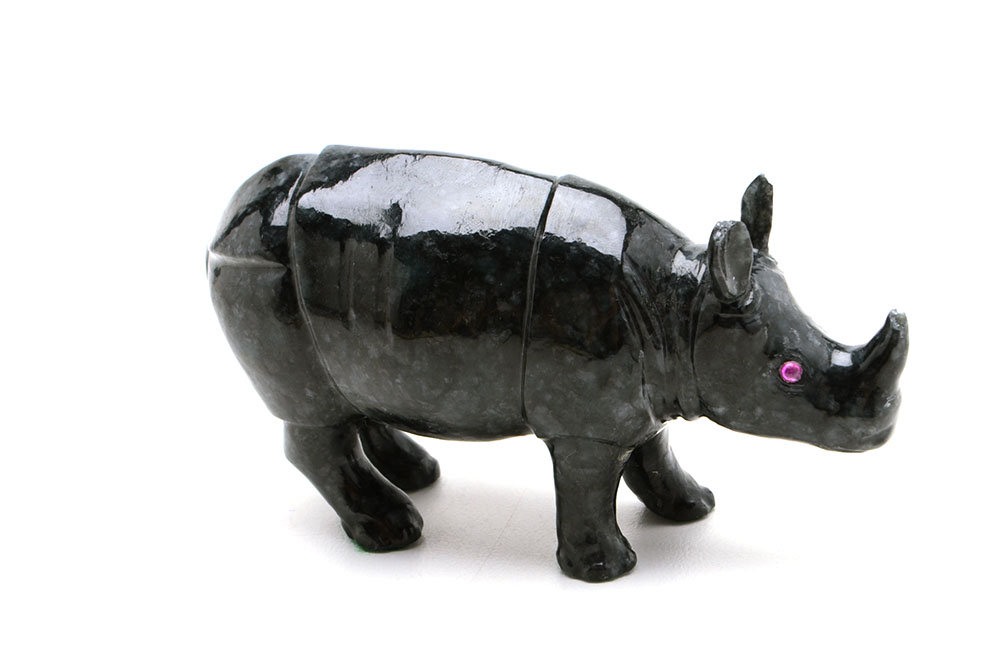 Carved Jadeite Rhinoceros Figure with Ruby Eyes