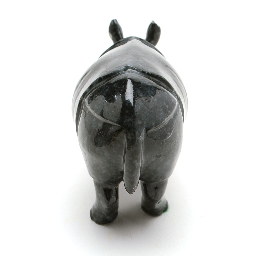 Carved Jadeite Rhinoceros Figure with Ruby Eyes