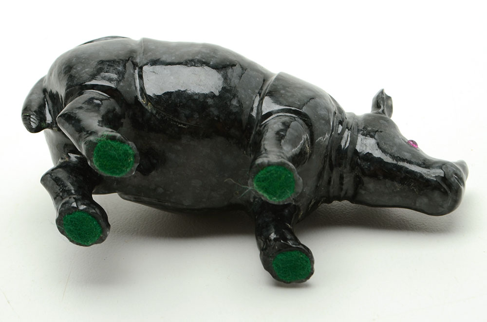 Carved Jadeite Rhinoceros Figure with Ruby Eyes
