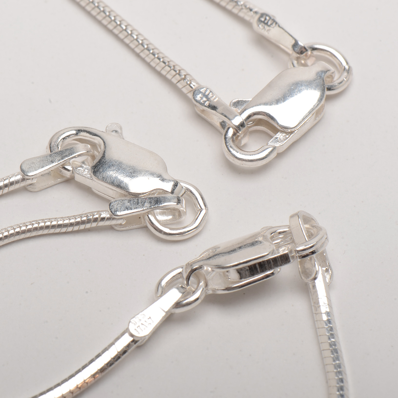 Sterling Silver Snake Chain and Cords With Cross Pendants