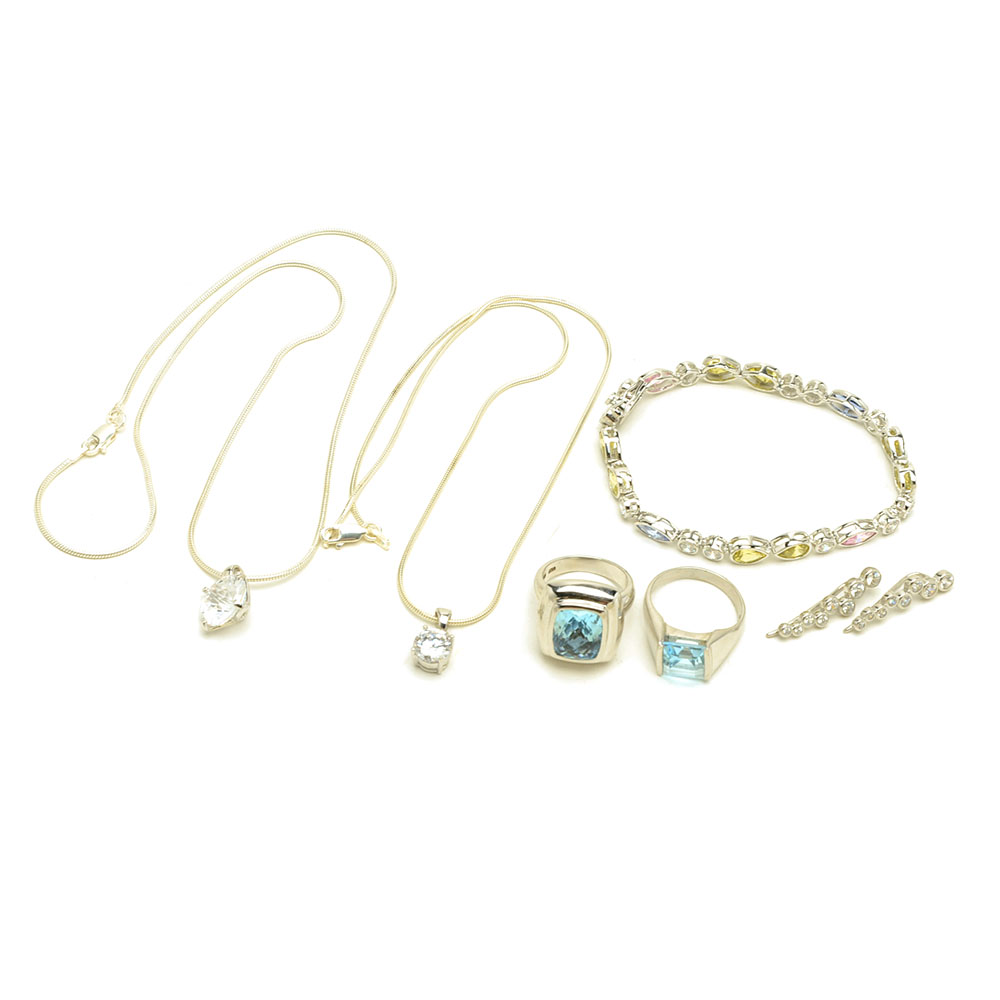 Sterling Jewelry Featuring Blue Topaz and Crystal Stones