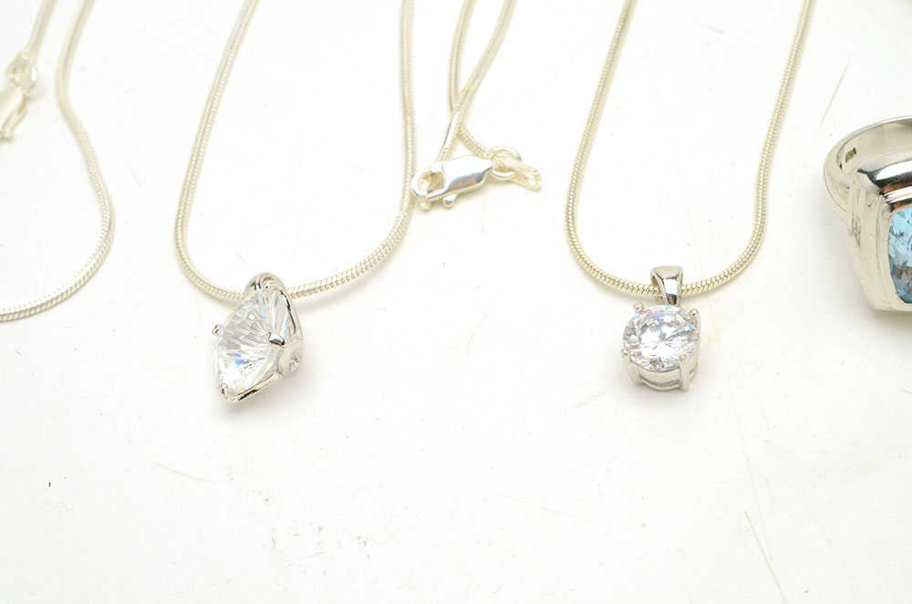 Sterling Jewelry Featuring Blue Topaz and Crystal Stones