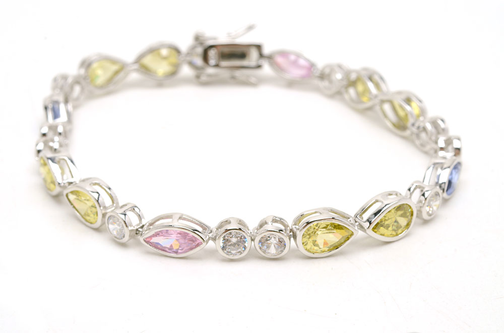 Sterling Jewelry Featuring Blue Topaz and Crystal Stones