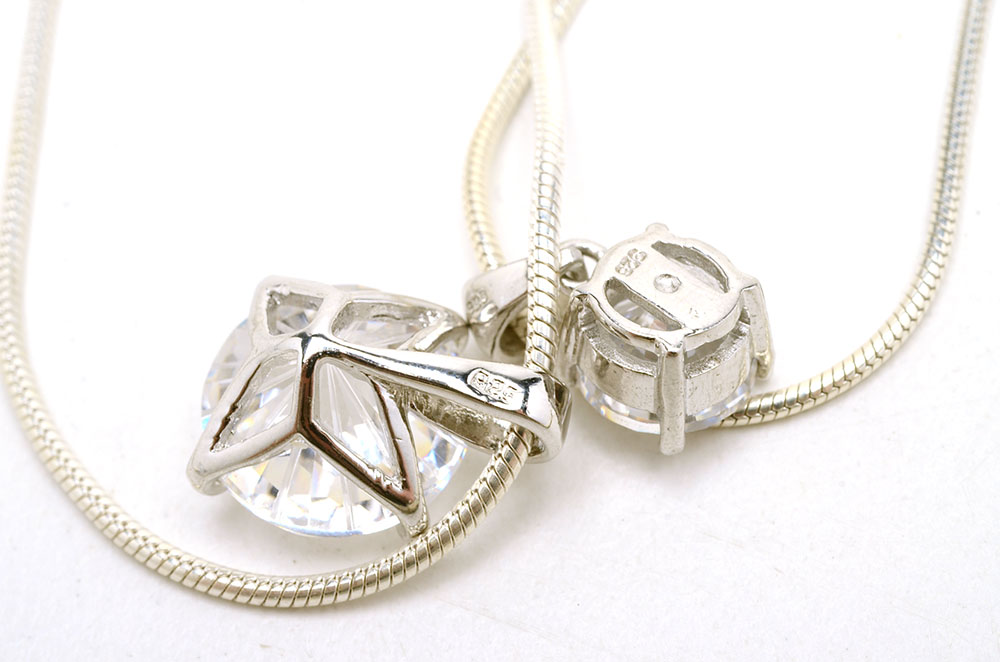 Sterling Jewelry Featuring Blue Topaz and Crystal Stones