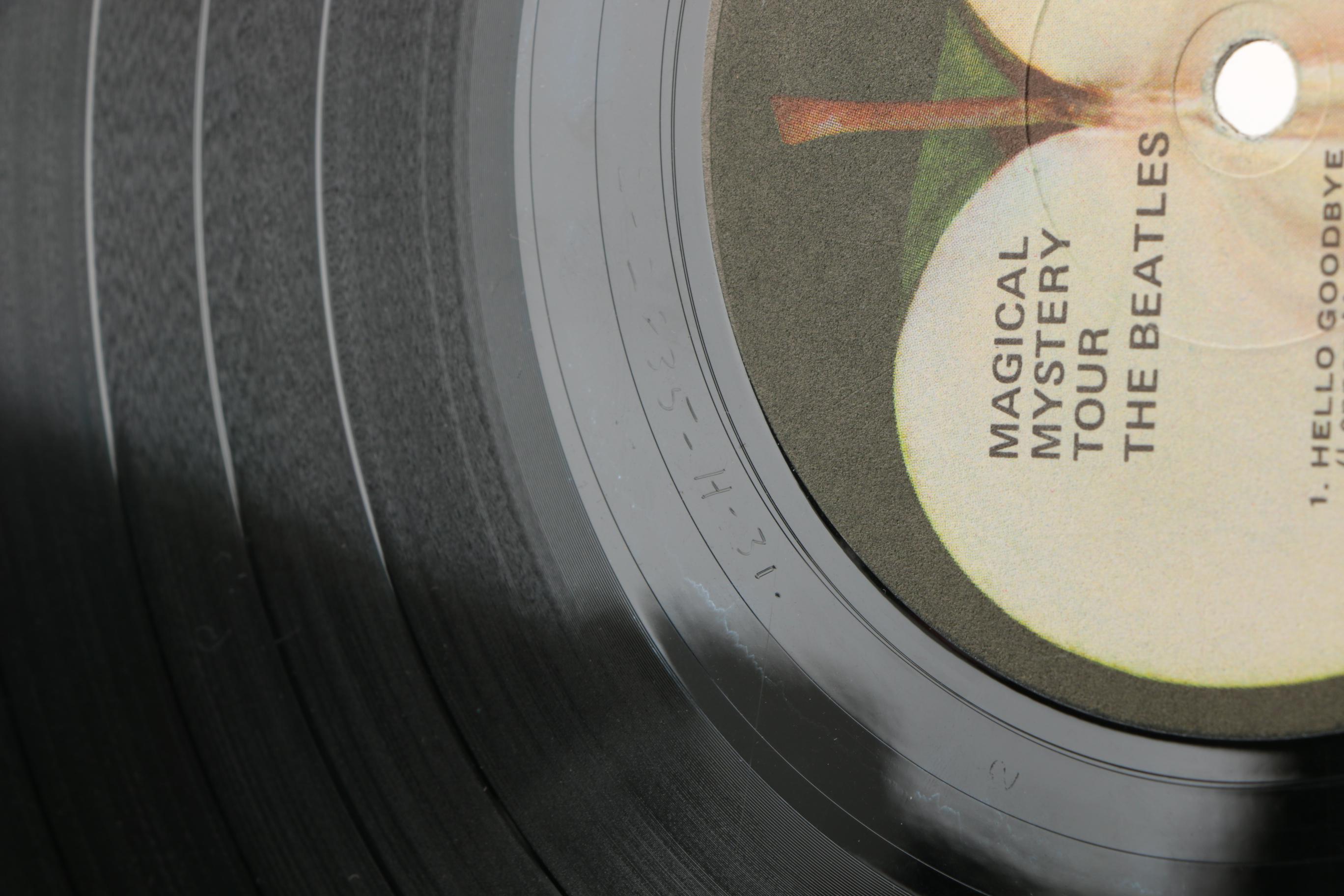 1960s Beatles LPs "Abbey Road" and "Magical Mystery Tour"