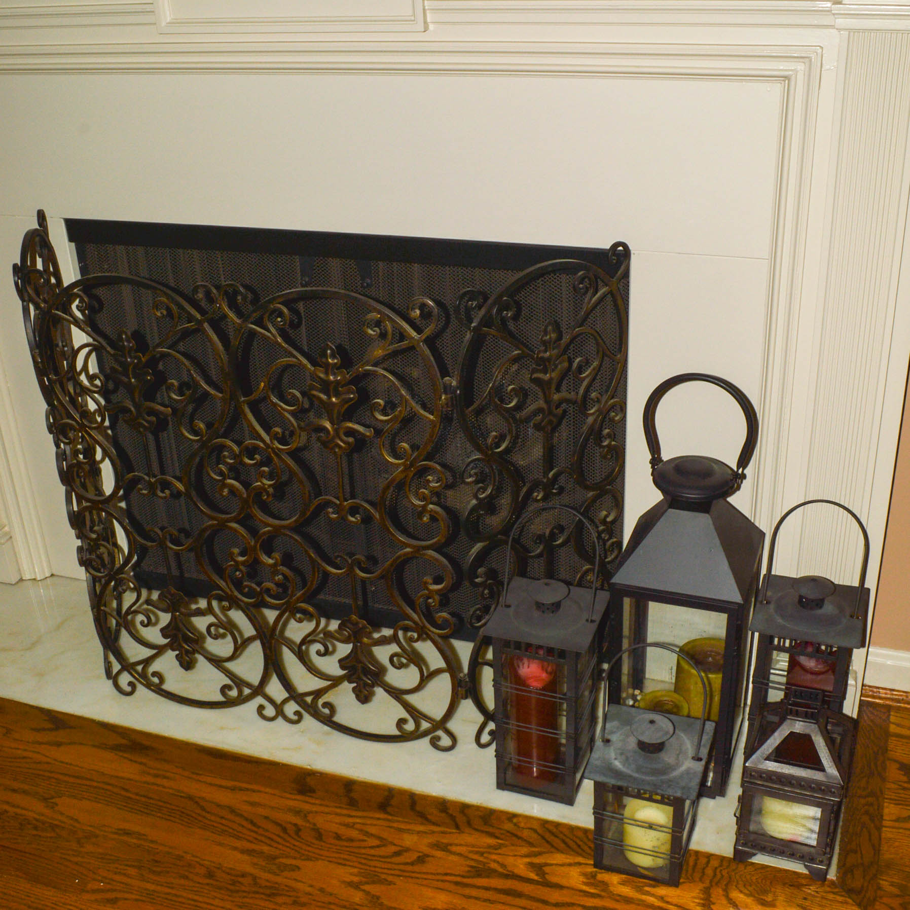 Metal Hearth Decor Including a Screen and Lanterns