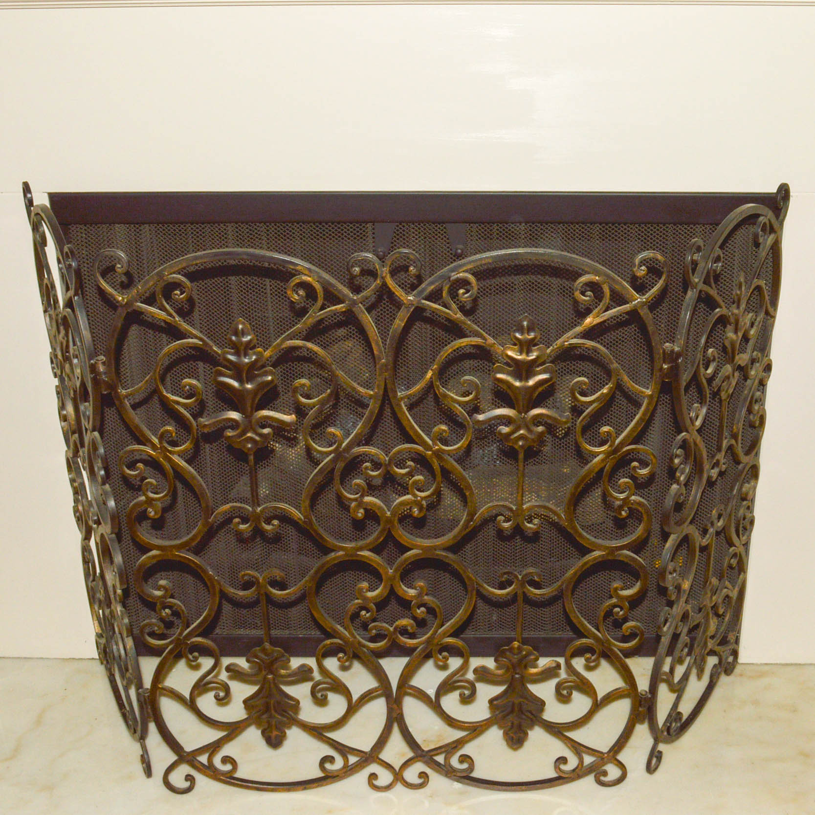 Metal Hearth Decor Including a Screen and Lanterns