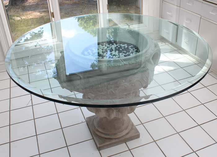 Grecian Inspired Pedestal Table With Glass Top