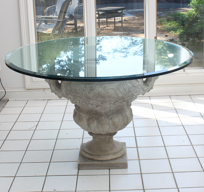 Grecian Inspired Pedestal Table With Glass Top